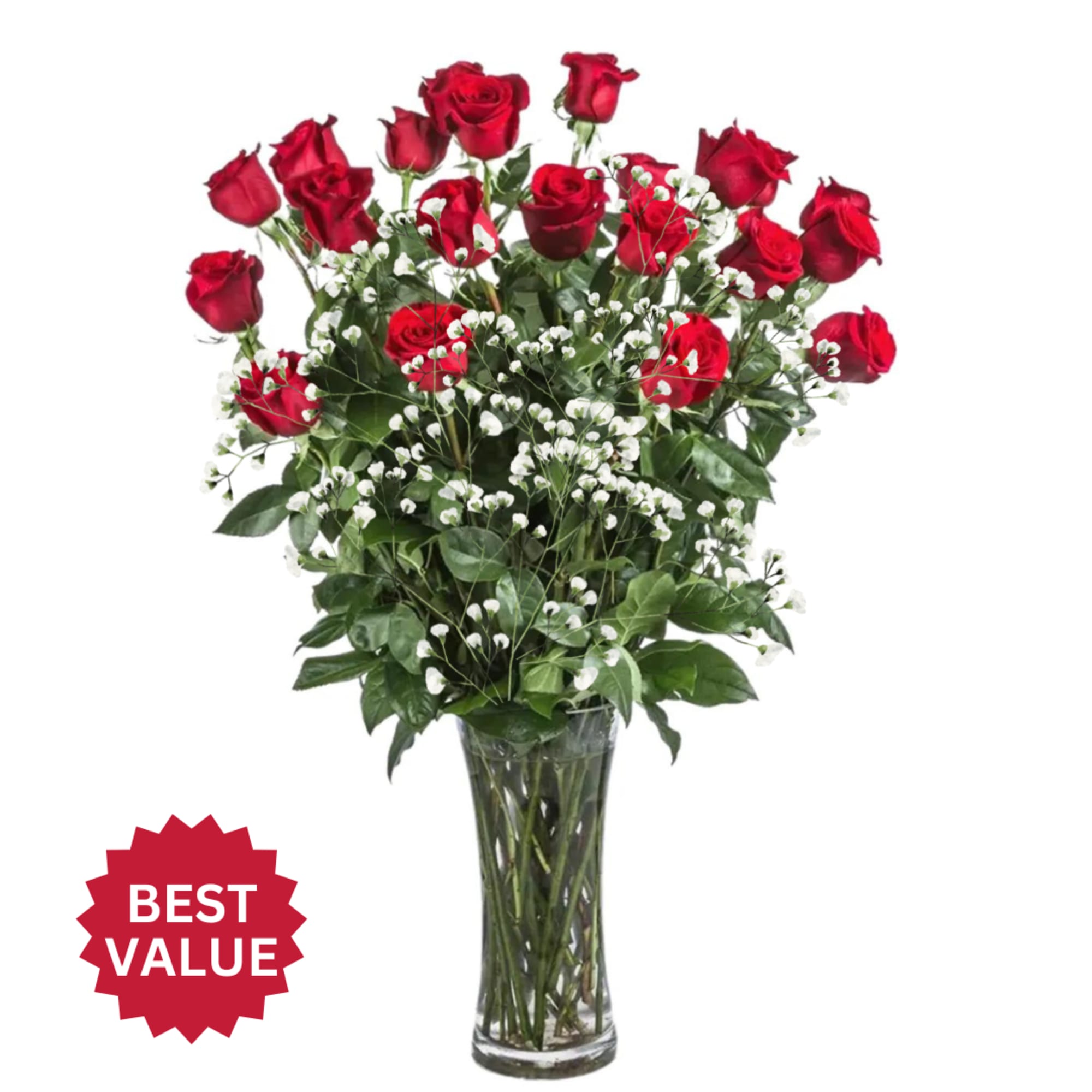 Classic roses in a vase with assorted foliage and accents. Roses are