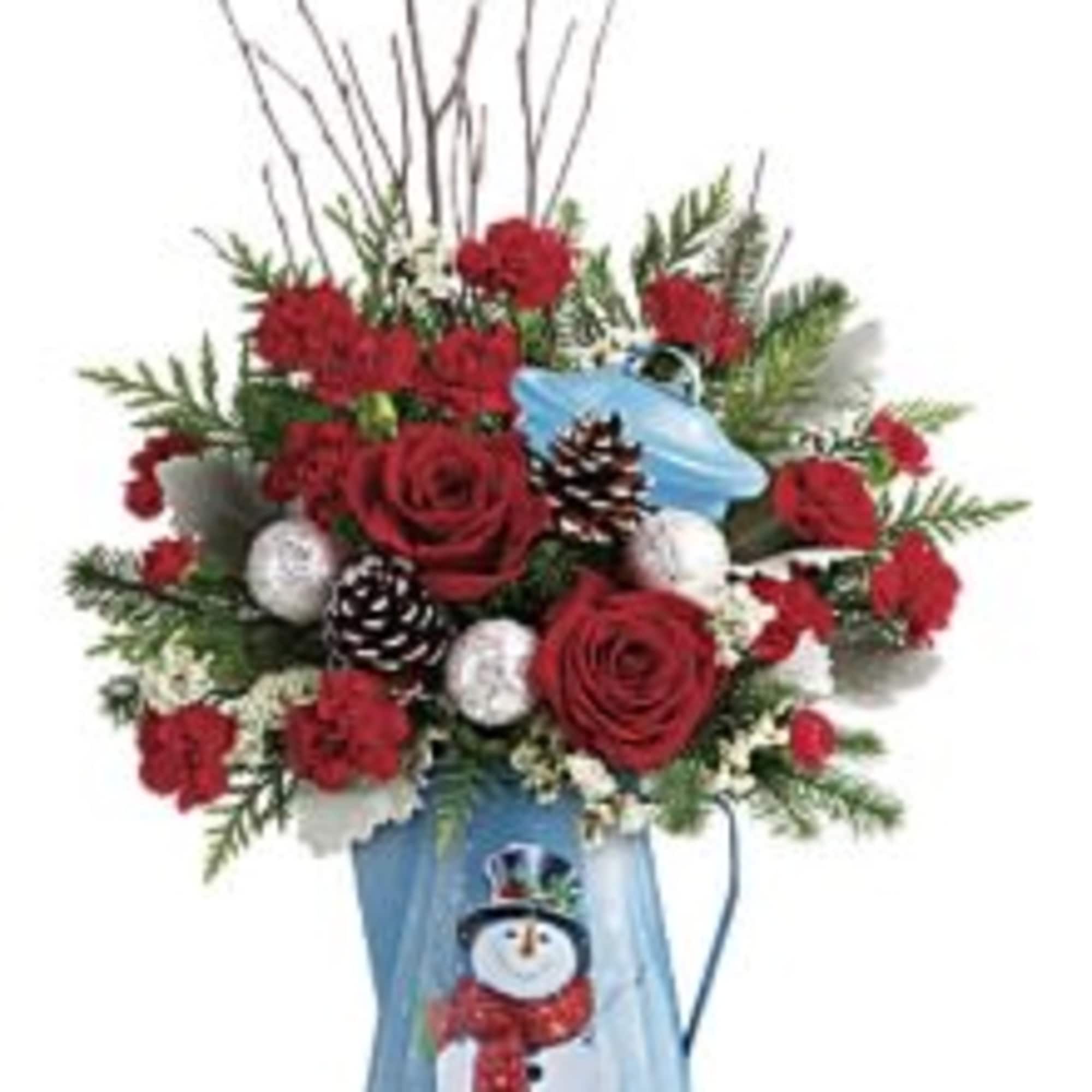 Pour on the Christmas charm with this radiant red bouquet, beautifully arranged