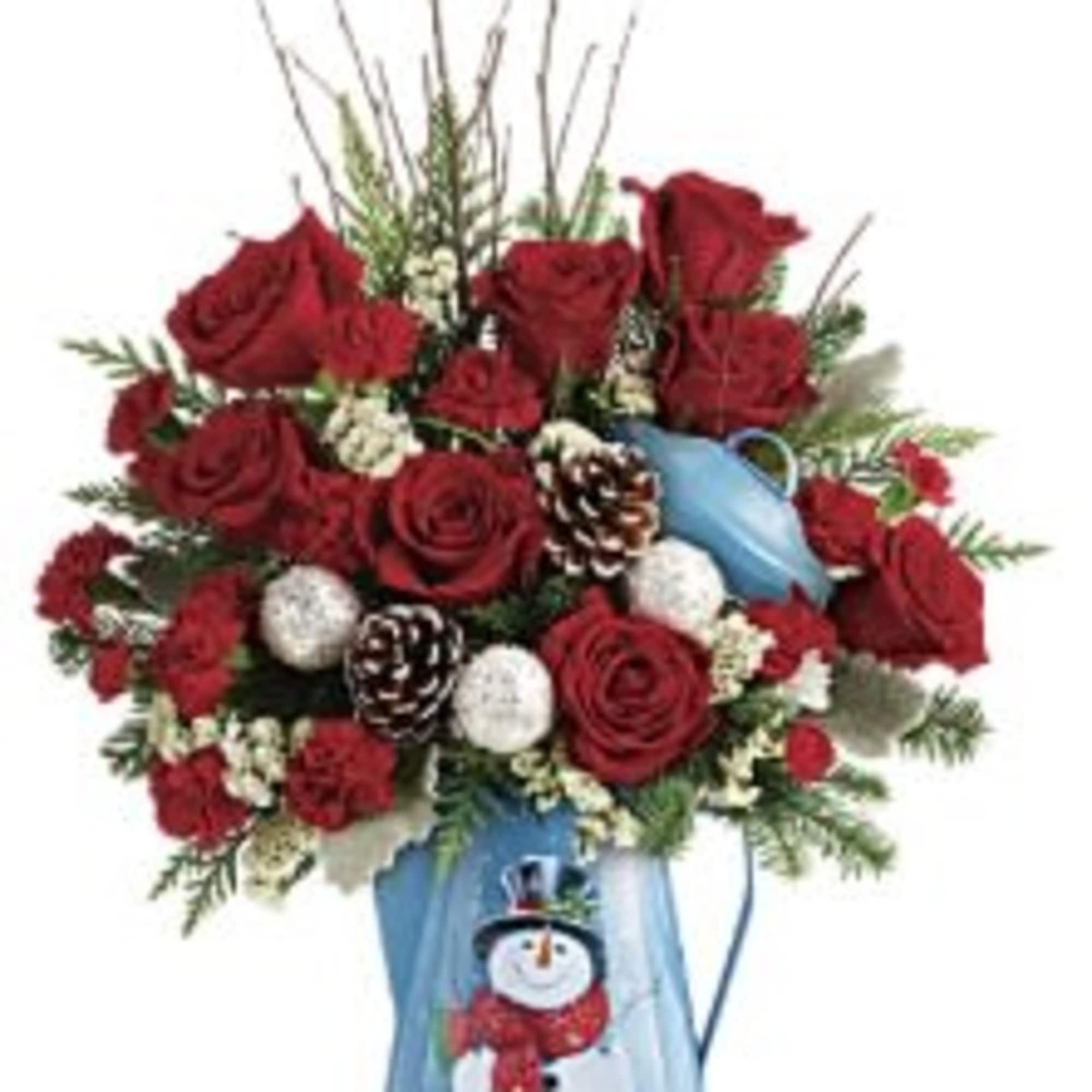 Pour on the Christmas charm with this radiant red bouquet, beautifully arranged