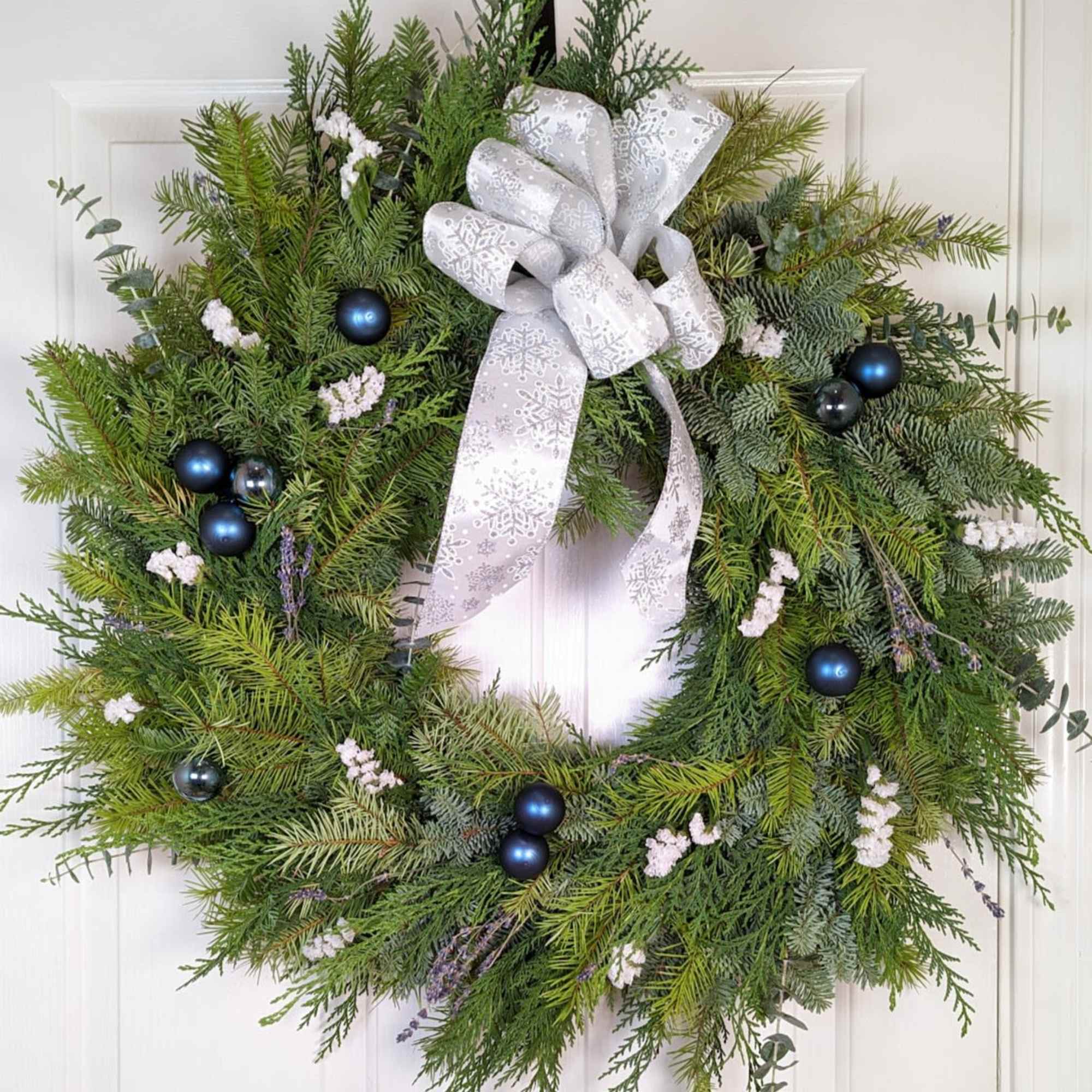 Embrace Winter Elegance with the Crystal Frost Wreath

Bring the serene beauty of