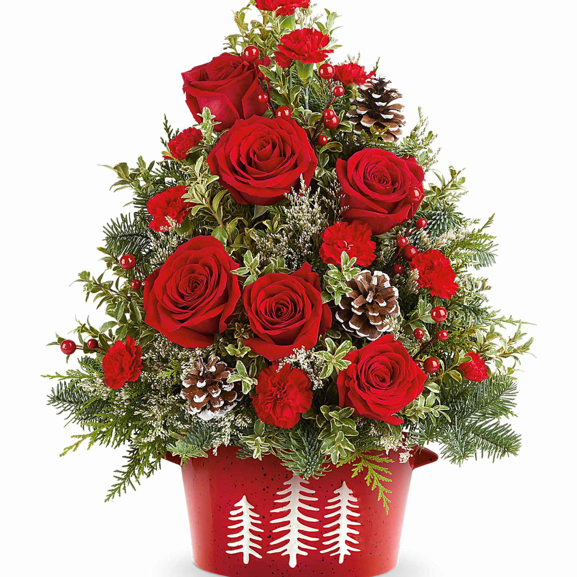 Bring holiday cheer home with our Holiday Traditions Tree. This festive floral