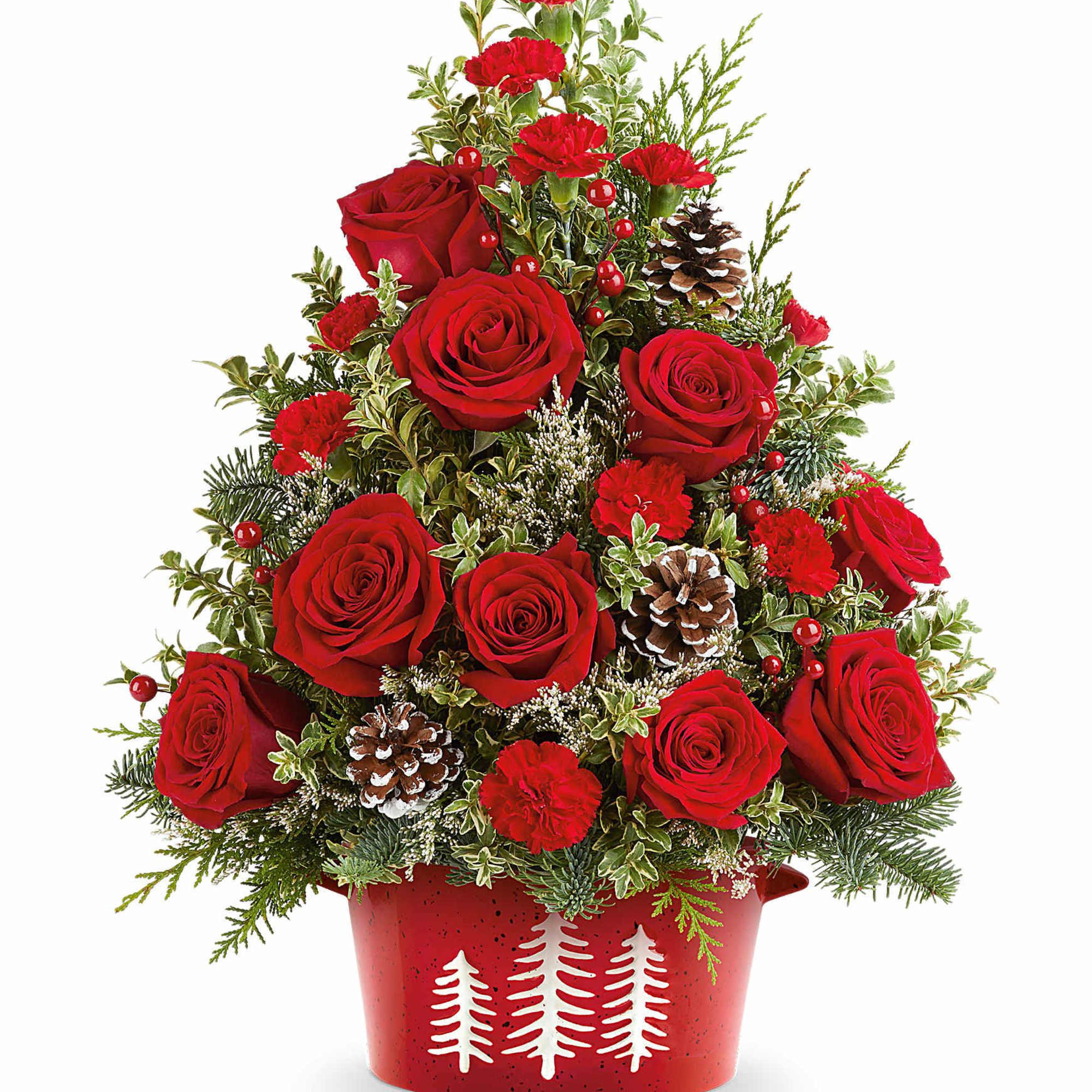 Bring holiday cheer home with our Holiday Traditions Tree. This festive floral