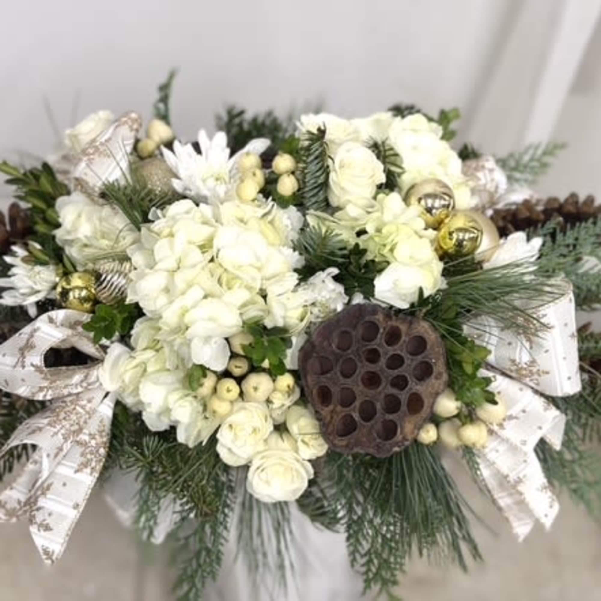 Elevate your holiday decor with White Holiday Elegance by Westford Florist! 