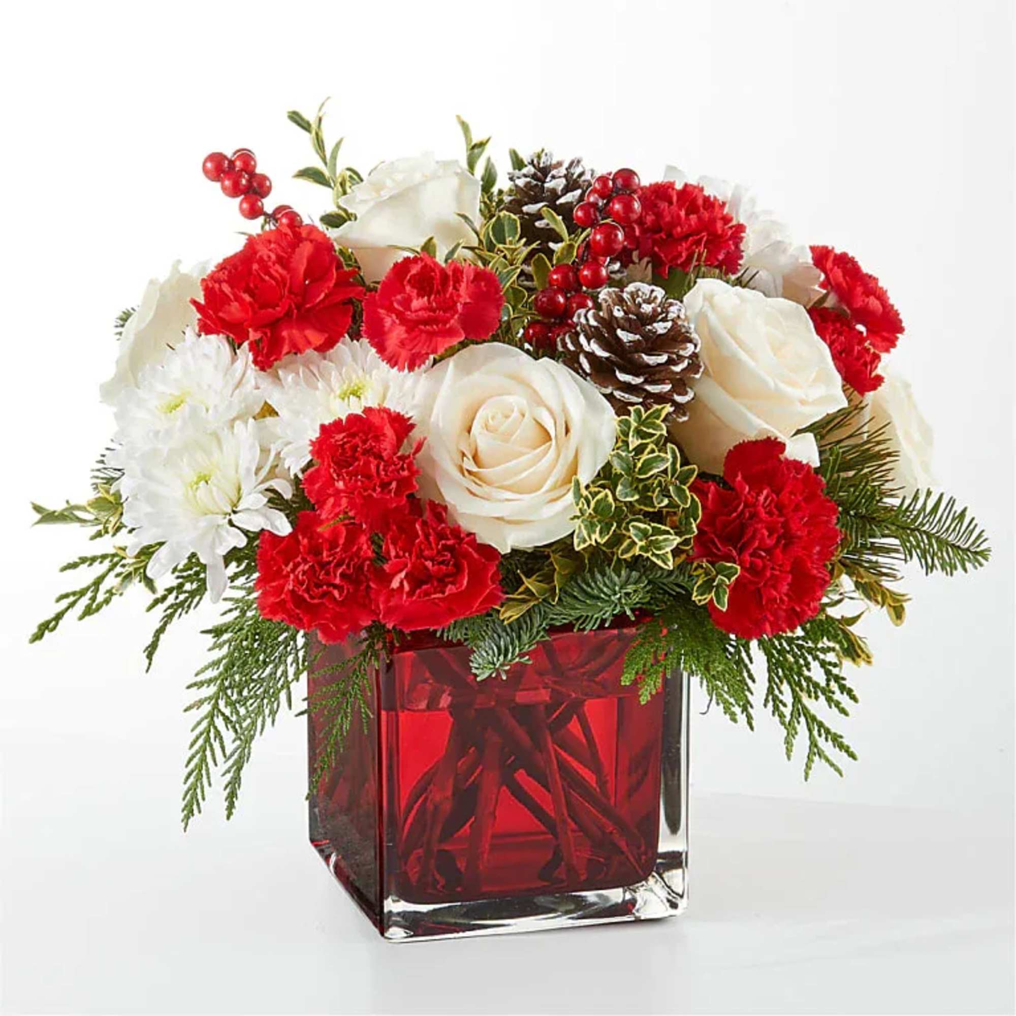An aromatic experiece, the Christmas Market Bouquet includes assorted seasonal greens to