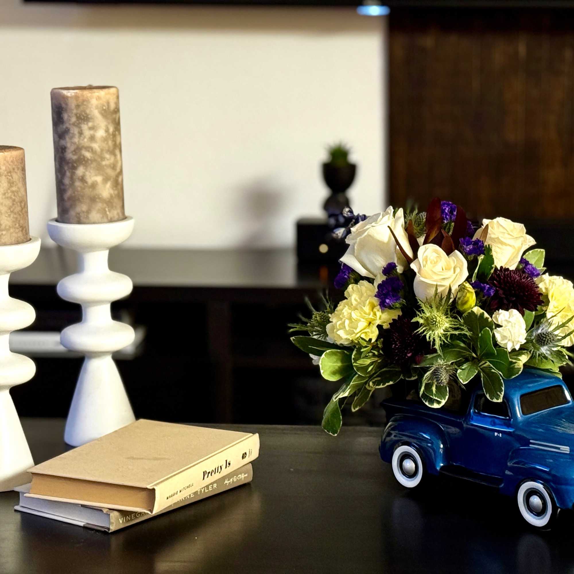  "Vintage Ford Pickup" floral creation, a charming and whimsical ensemble that