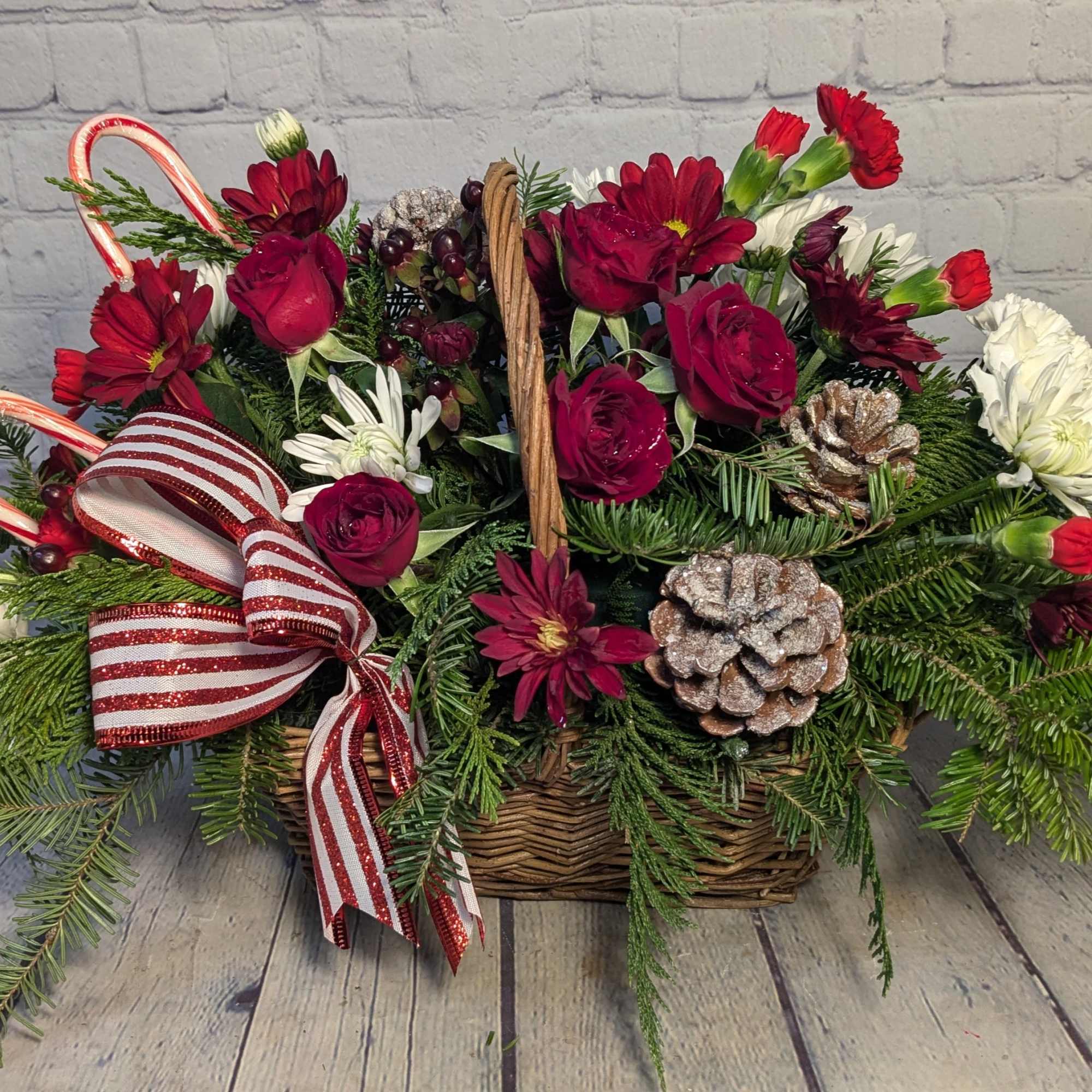 Embrace this Holly Jolly Christmas with red spray roses, chrysanthemums, carnations, hypericum