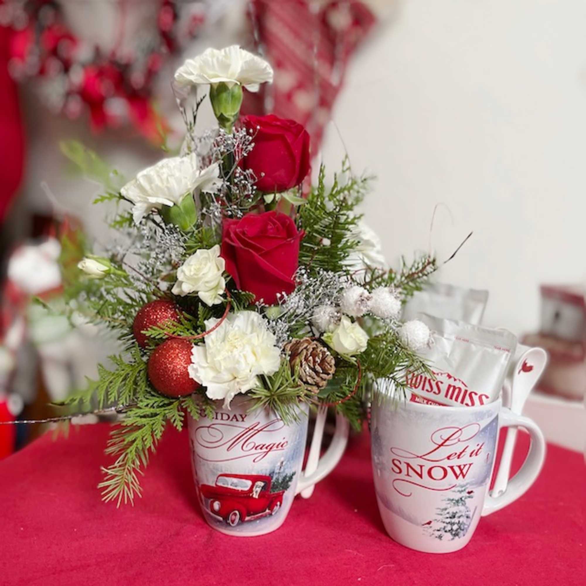 Give the gift of seasonal evergreens and flowers with a keepsake mug