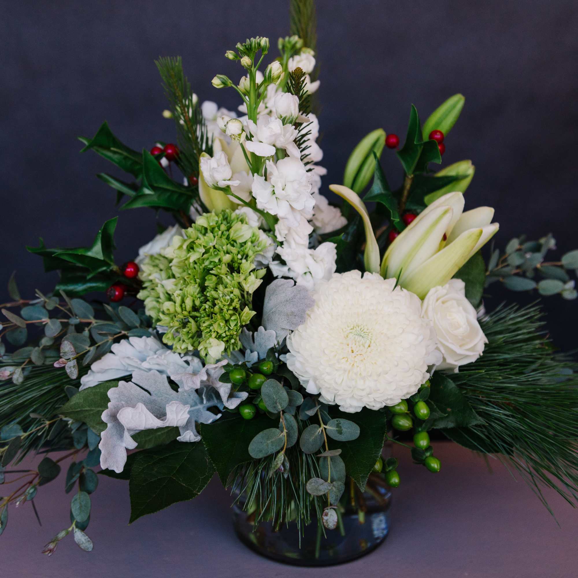 An assortment of beautiful winter white blooms with a touch of festive