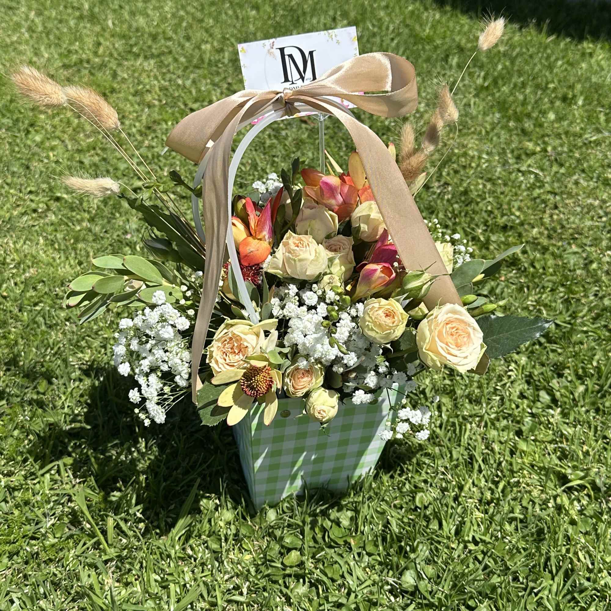 Coquette is a delicate and feminine floral arrangement designed in an elegant