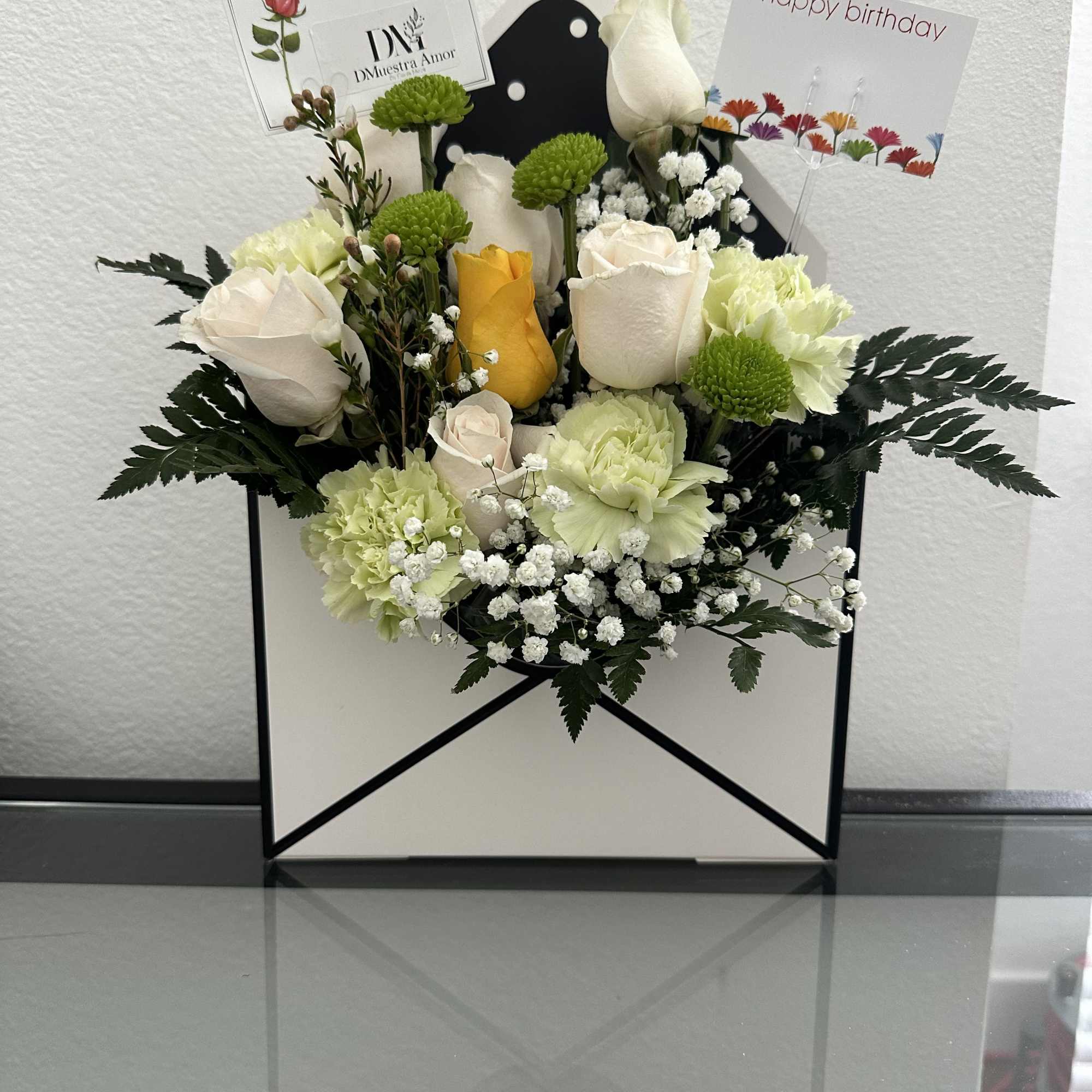 Mail Rose is a charming and original arrangement designed inside a boutique-style