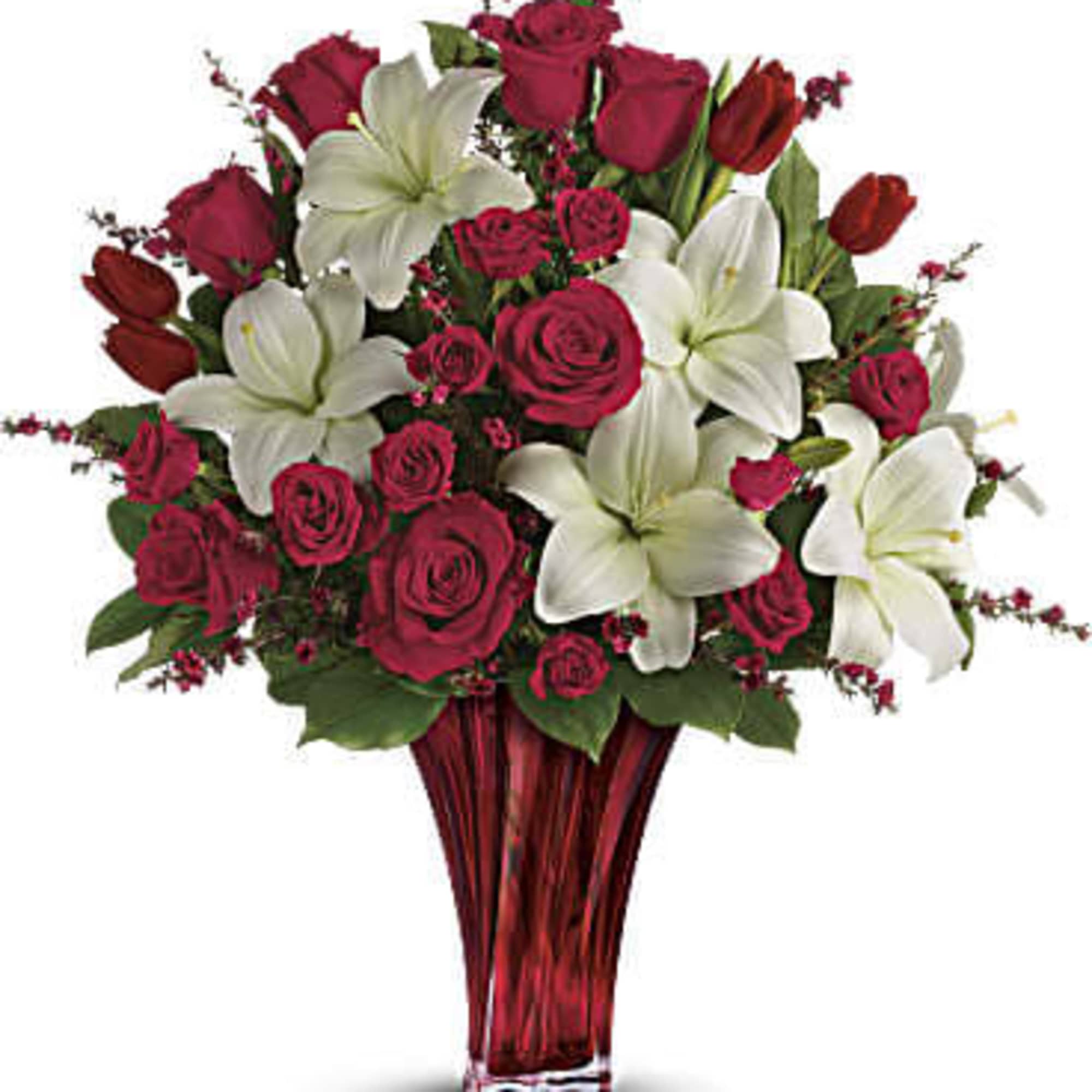 This passionate display of red roses, red spray roses, red tulips, and