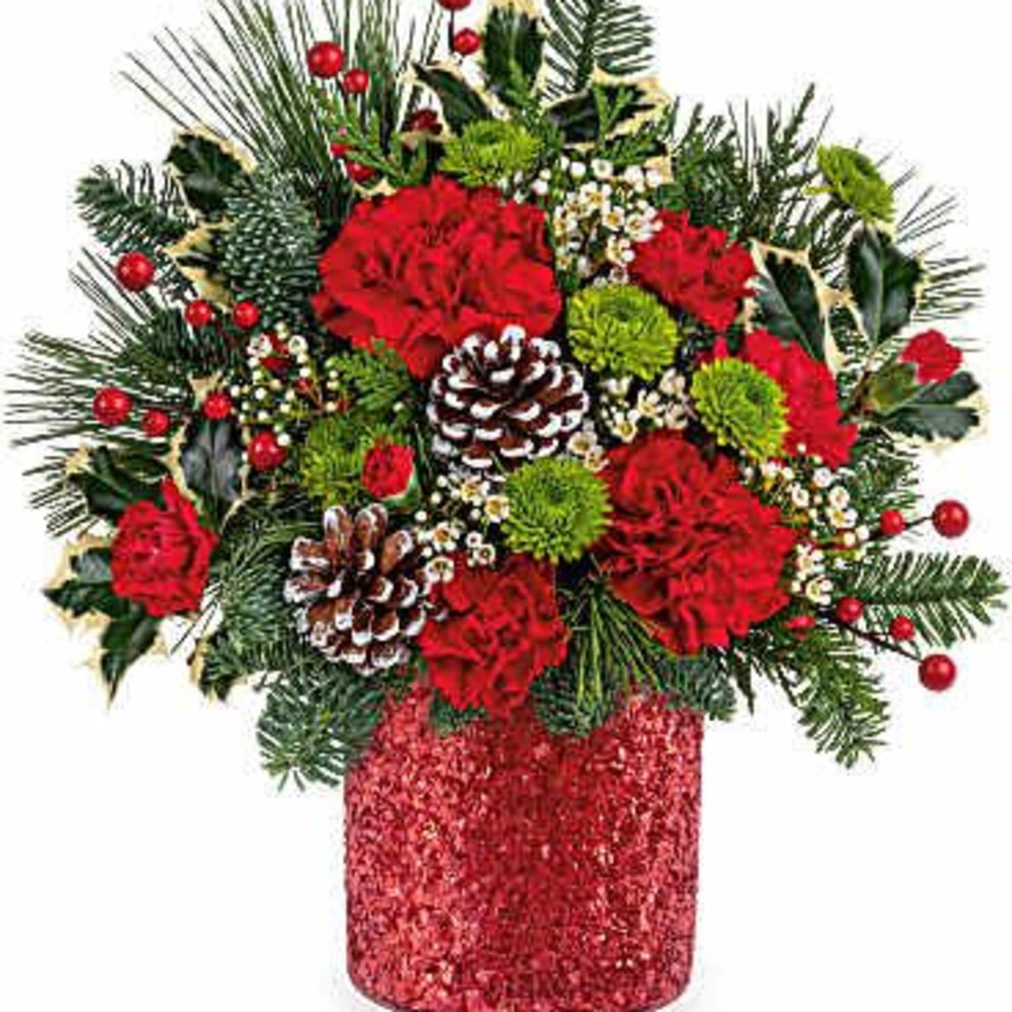 Teleflora&#039;s Crimson Wishes Bouquet dazzles with red and green holiday blooms, accented