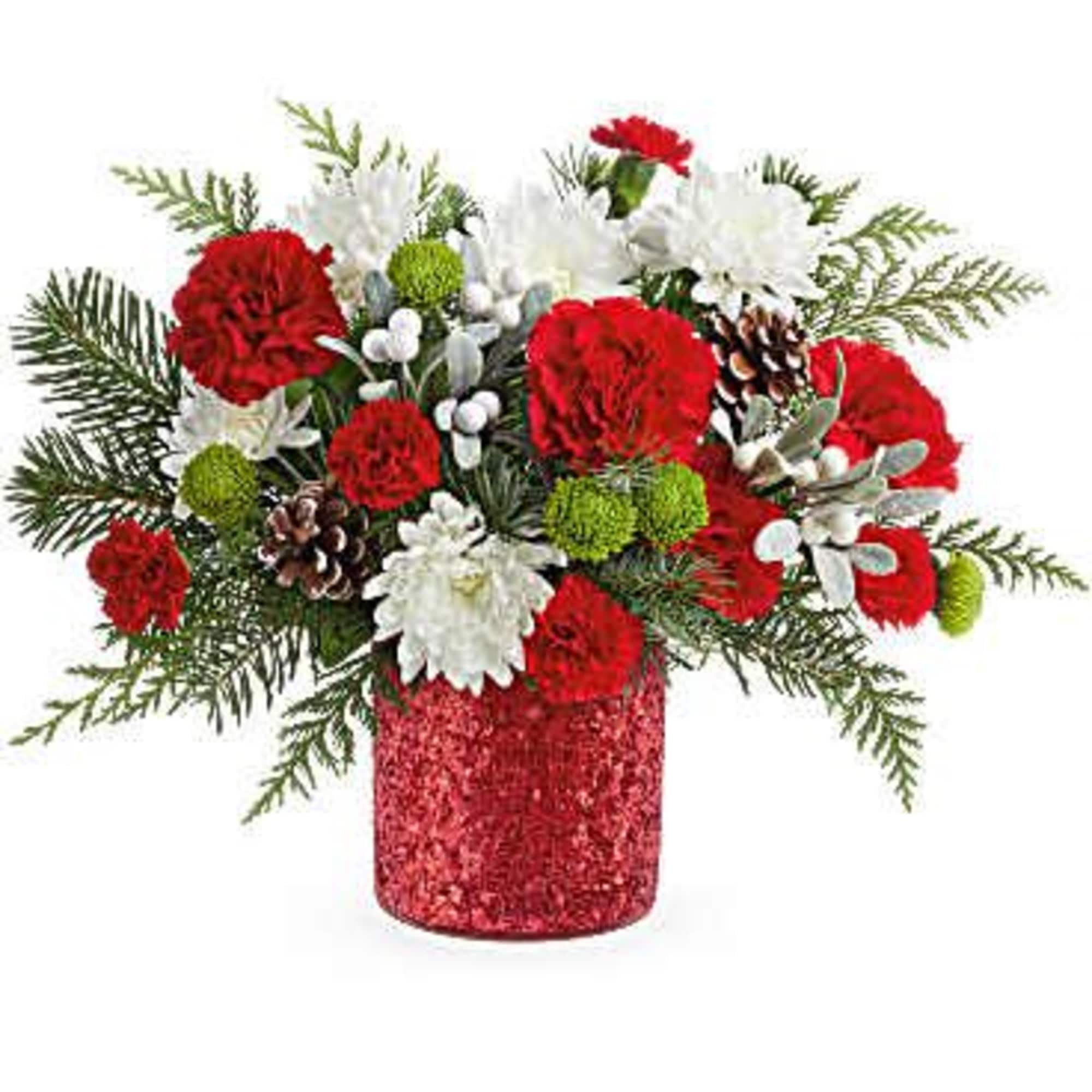 Teleflora&#039;s Christmas Magic Bouquet sparkles with red and green blooms, festive evergreens