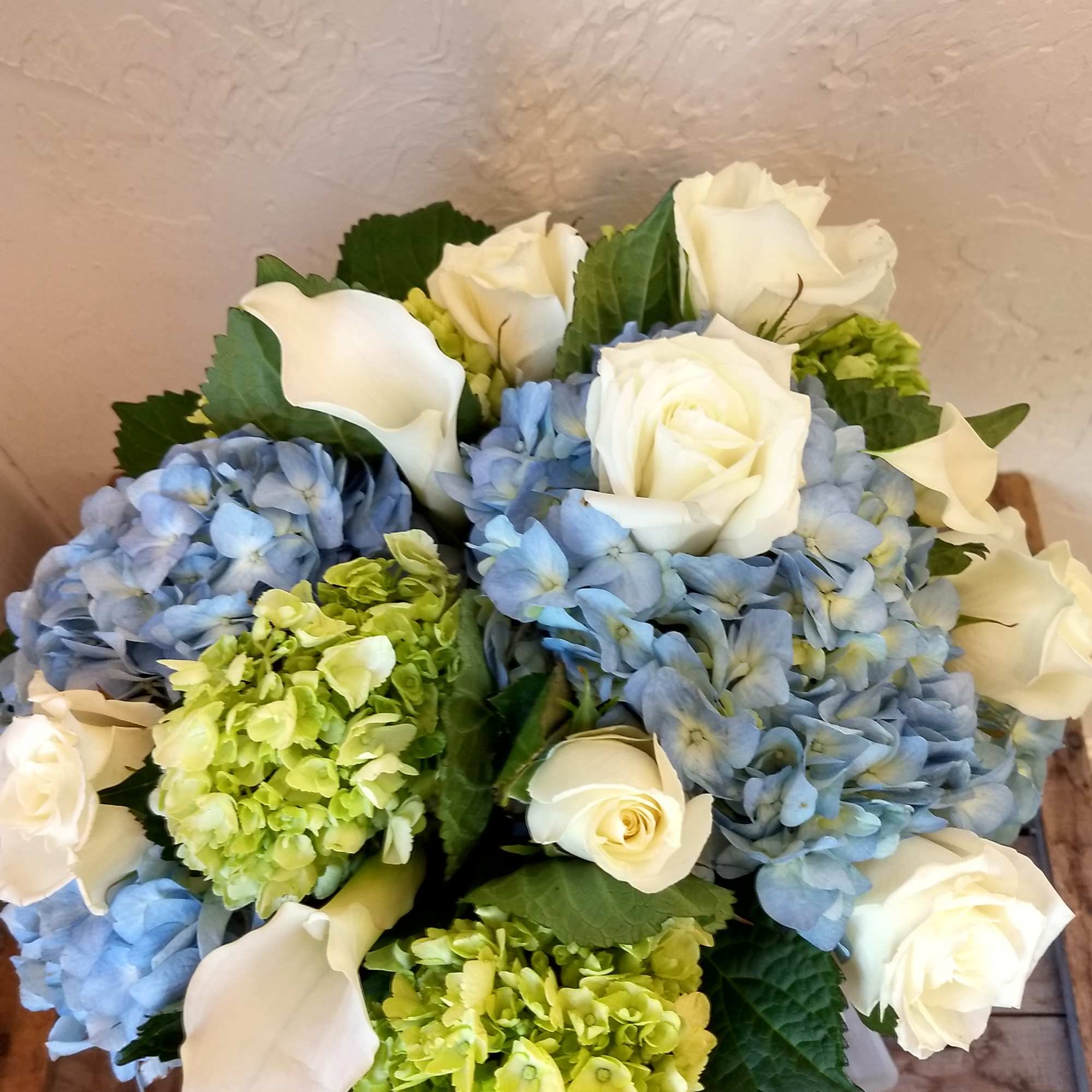 Clouds
Elegant and timeless, Clouds is a lovely floral arrangement that captures the