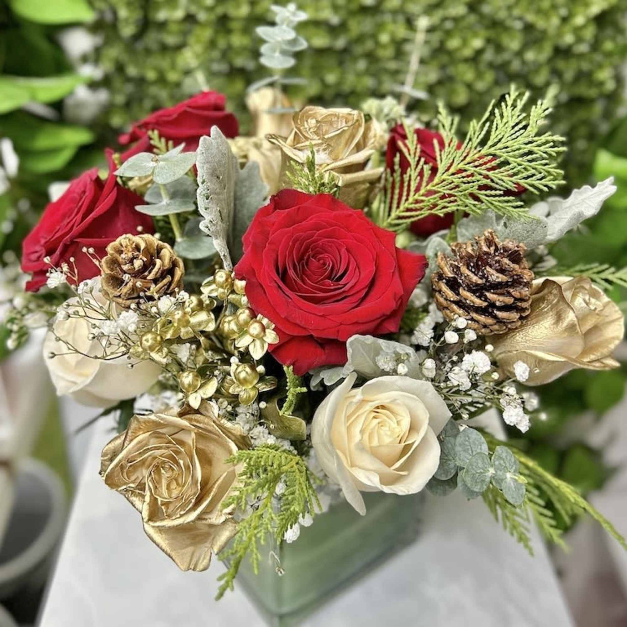 Noel&#039;s Favorite Christmas Bouquet: White, red, and gold Christmas look with assortment