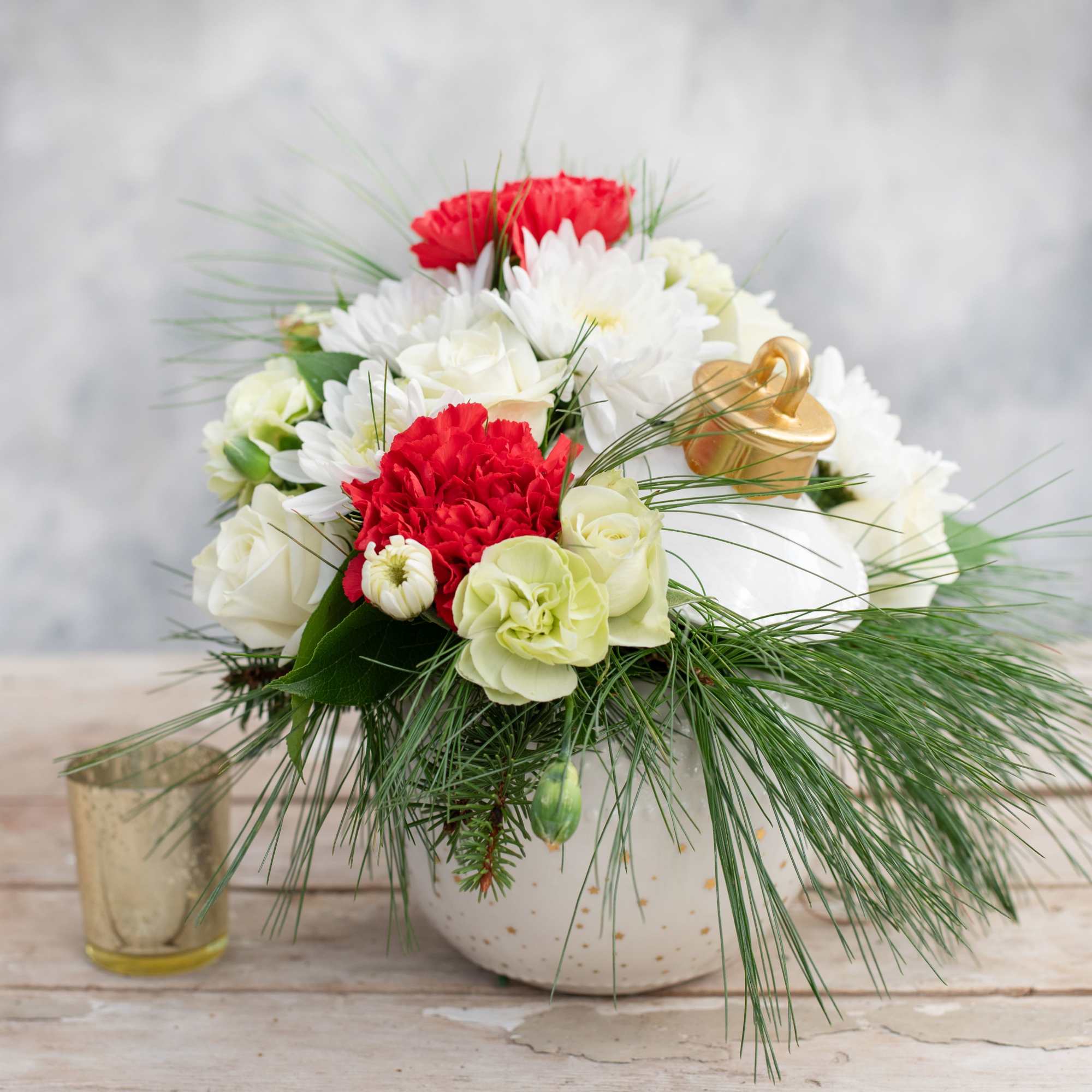 What better way to celebrate the holidays then with this festive arrangement.