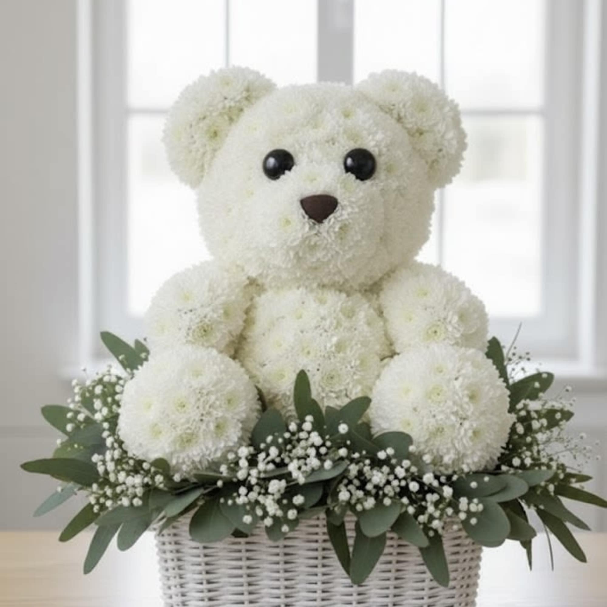 A hug made of flowers! This one-of-a-kind, handcrafted bear is created entirely