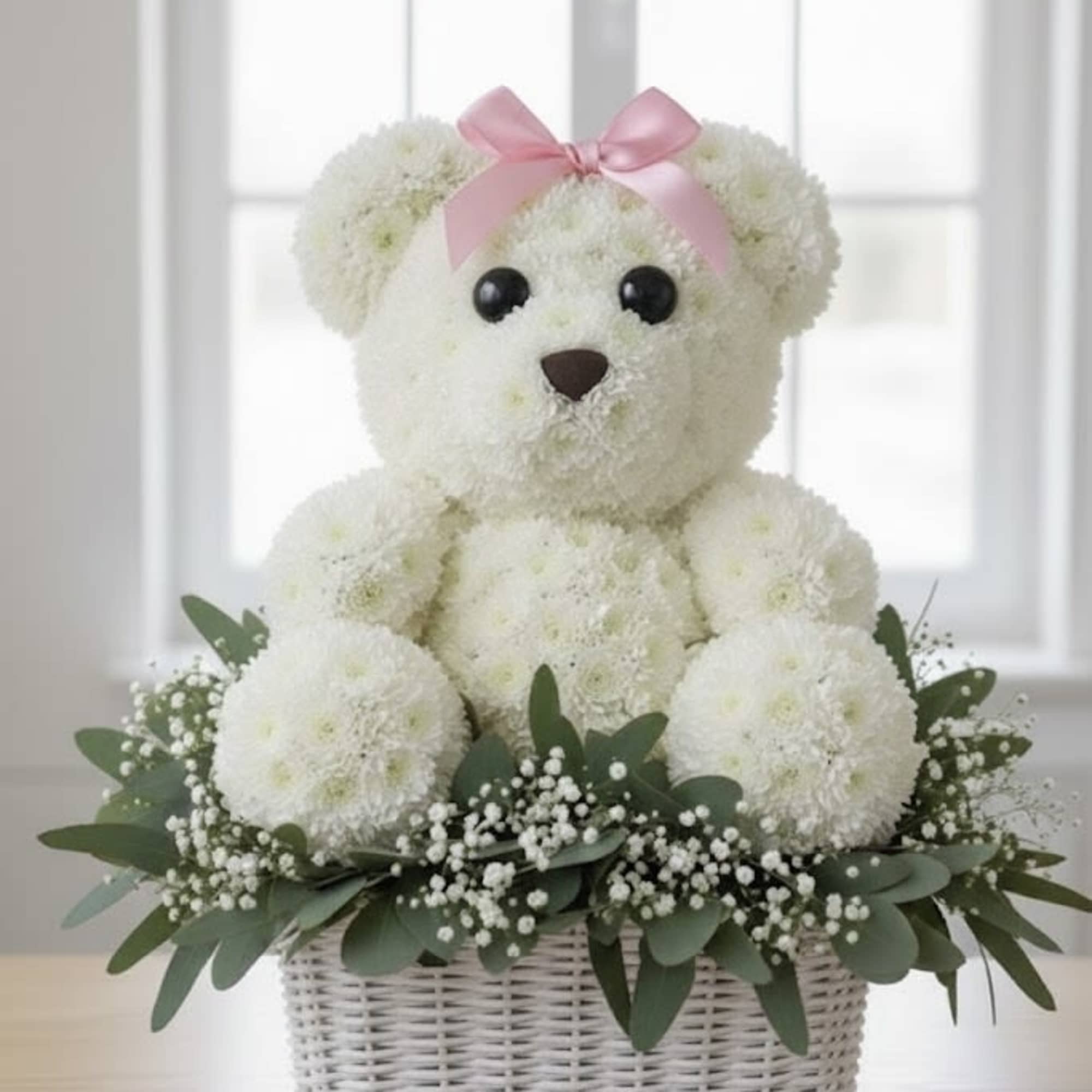 A hug made of flowers! This one-of-a-kind, handcrafted bear is created entirely