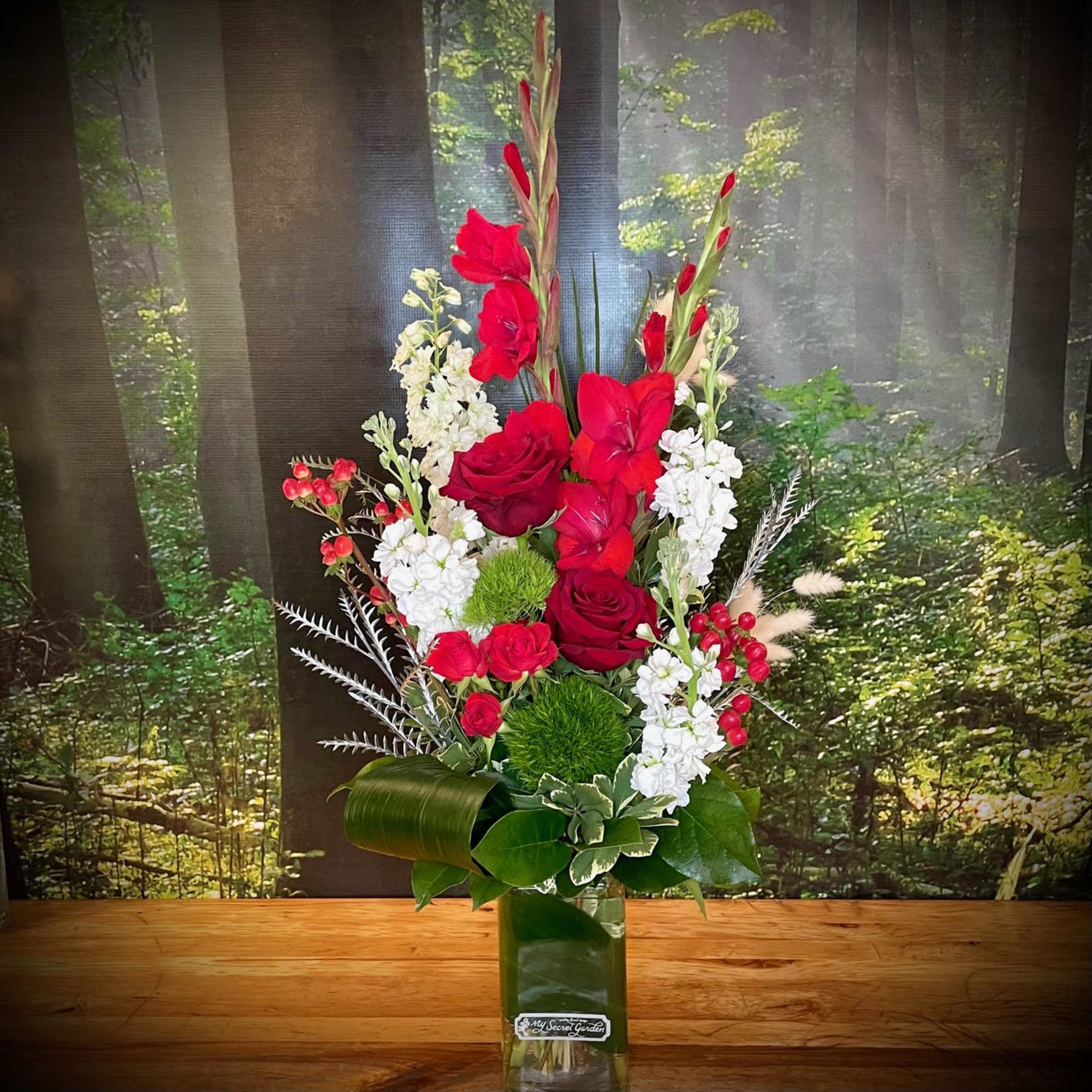 The Winter Ruby is a beautiful arrangement in red and white tones