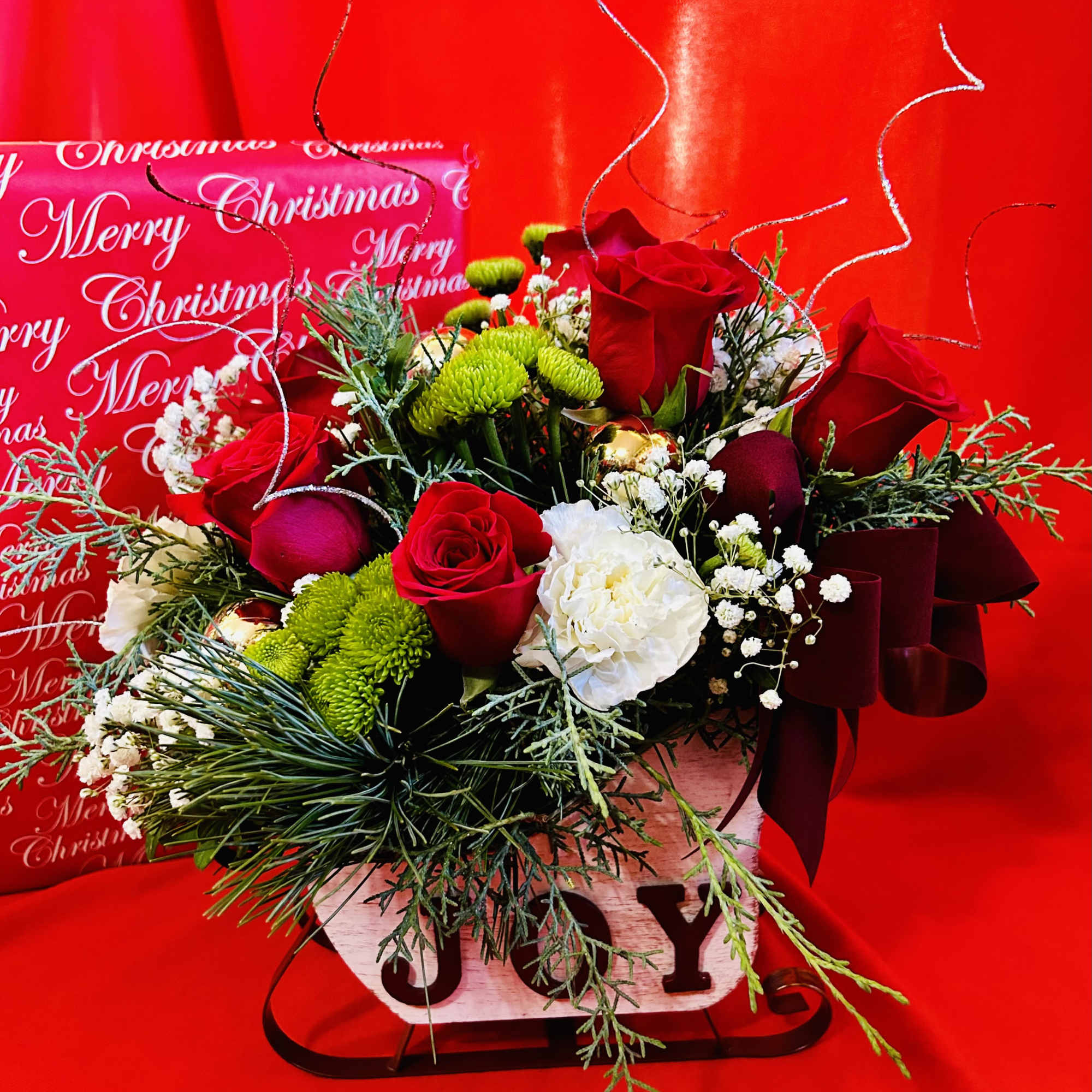 Christmas Wooden White Sleigh with JOY in red lettering. If you love