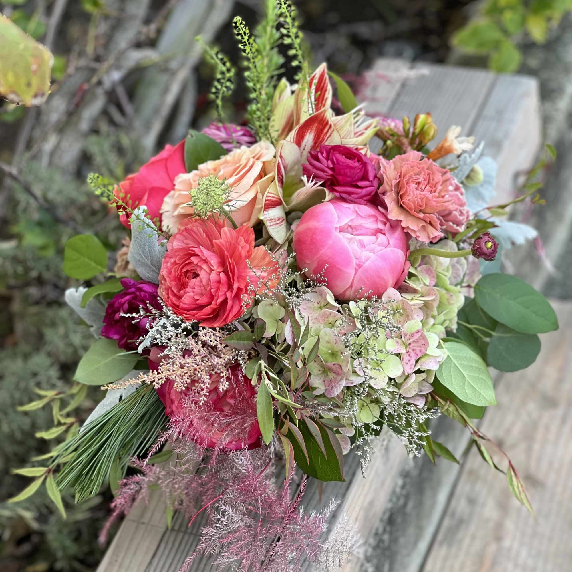 The arrangement showcases he beauty of winter with delicate blooms. It is