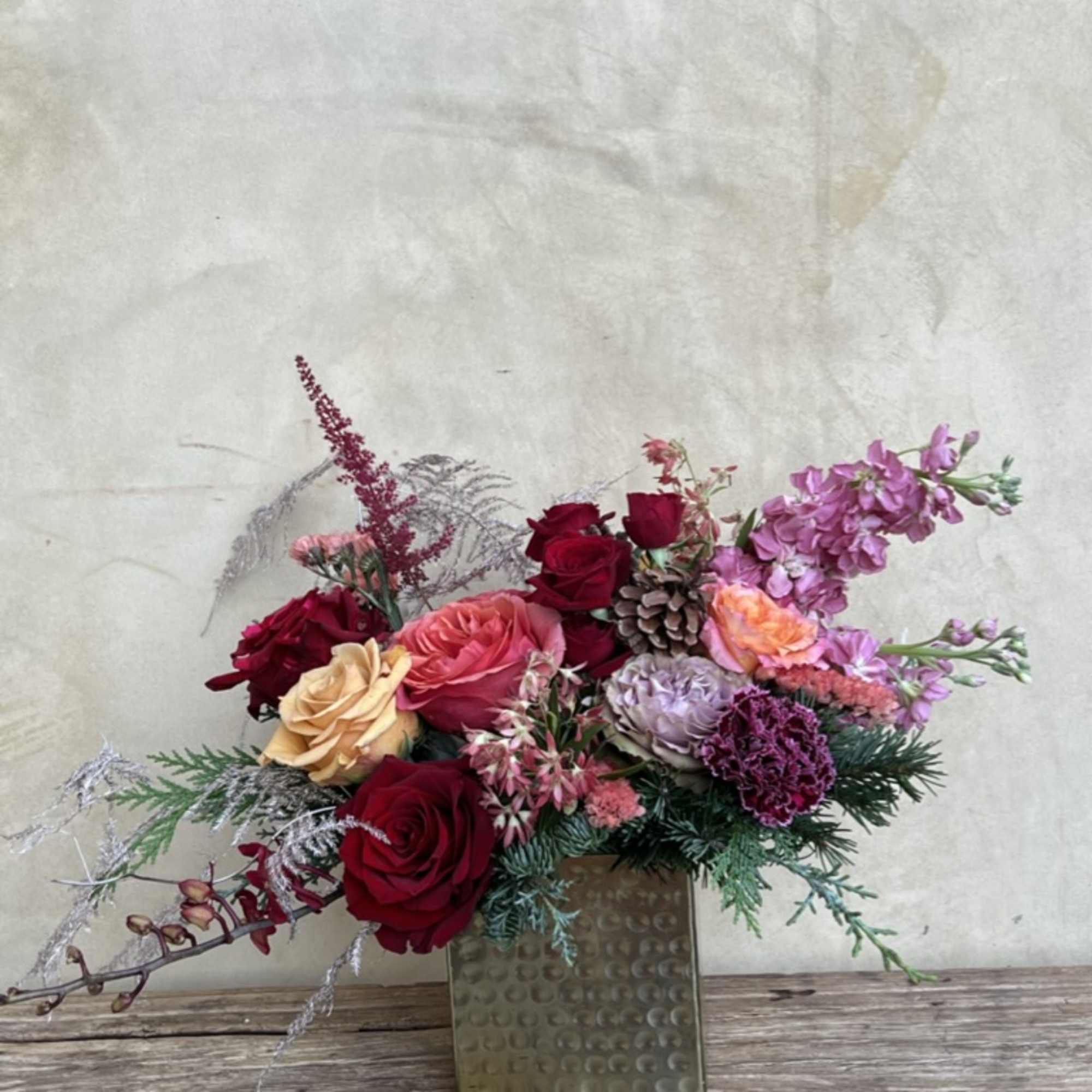 Sweet and stylish this arrangement is a treat for the eyes, mixing