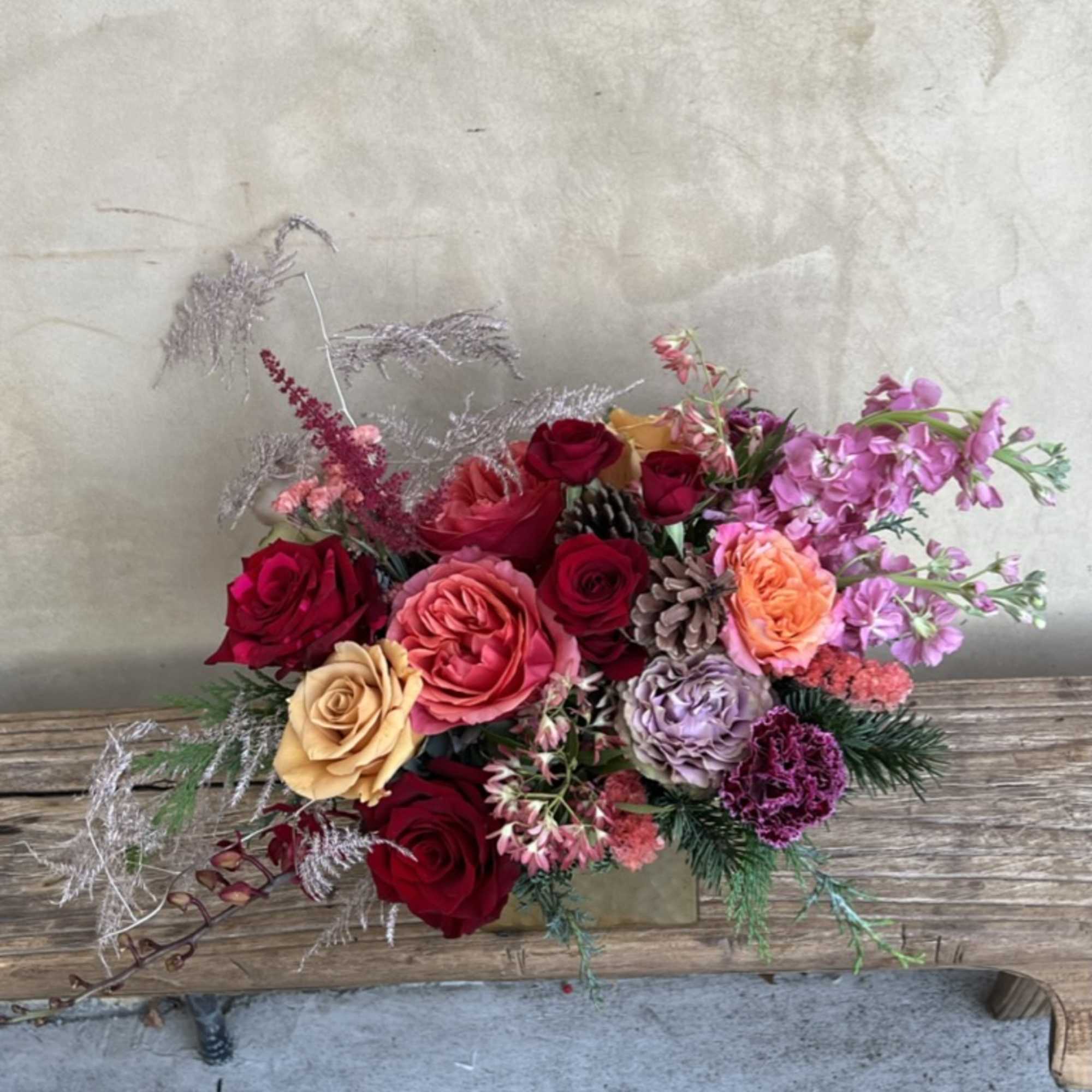 Sweet and stylish this arrangement is a treat for the eyes, mixing