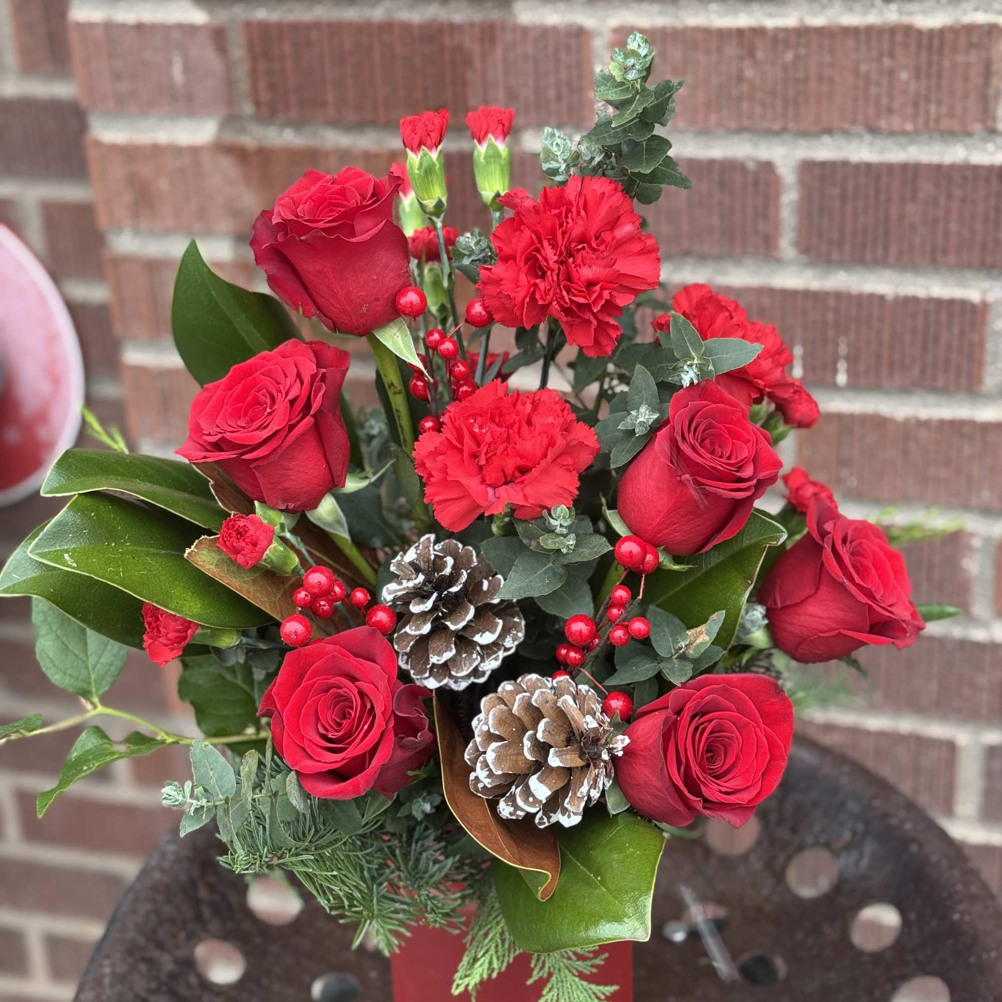 Simply unique, this gorgeous green and red design is artfully hand-arranged in