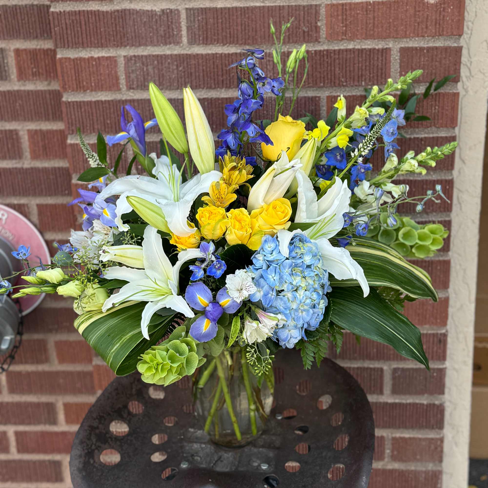 Reminiscent of the French countryside style, this stylized piece is full of