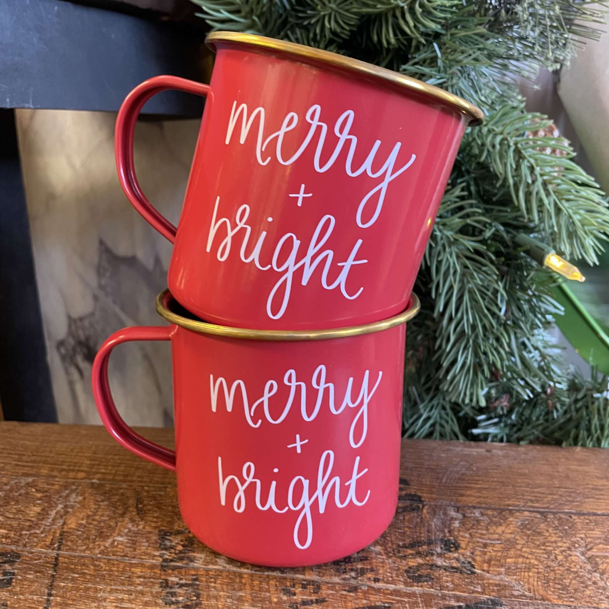 A keepsake metal camp style mug filled with merry &amp; bright flowers!