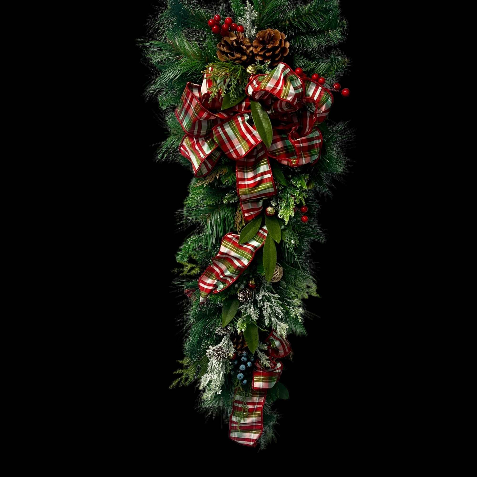 Celebrate the season with this stunning holiday teardrop swag, featuring lush greenery