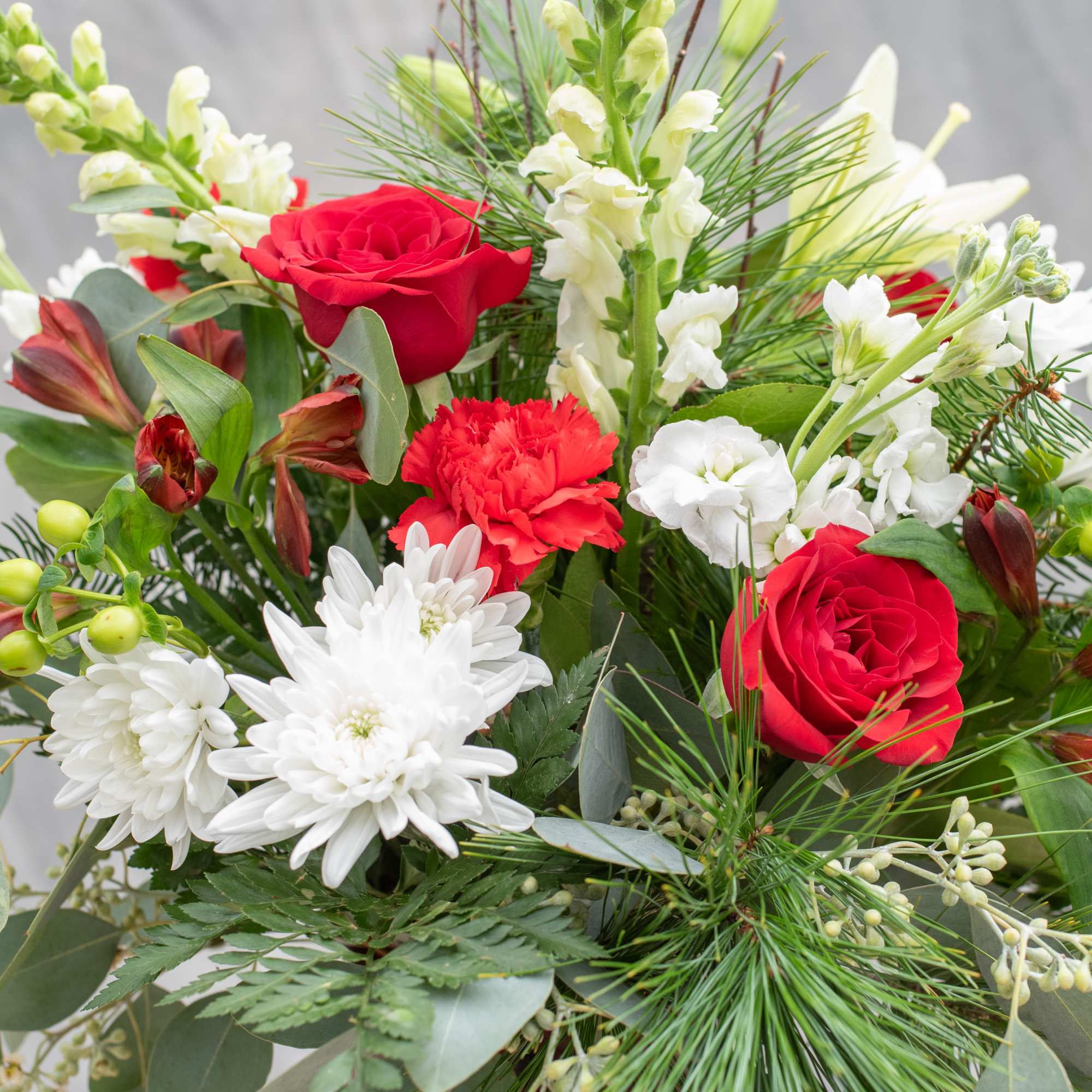 Envision this elegant tall red glass vase on your dining room table