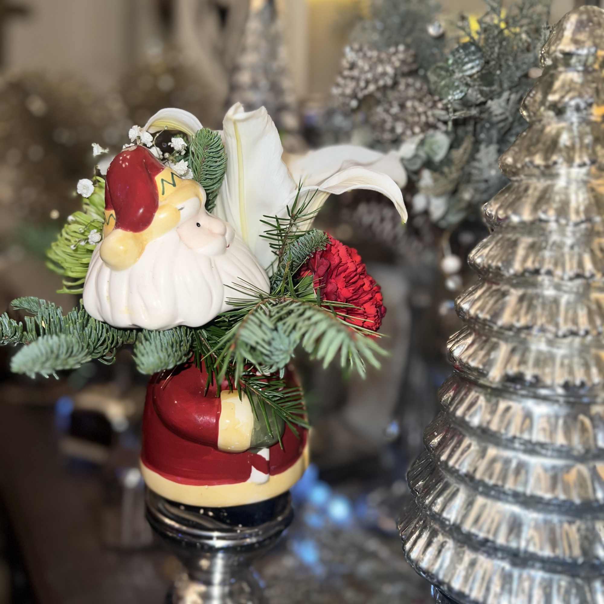 An adorable Ceramic Santa keepsake mug with a separate Santa head lid