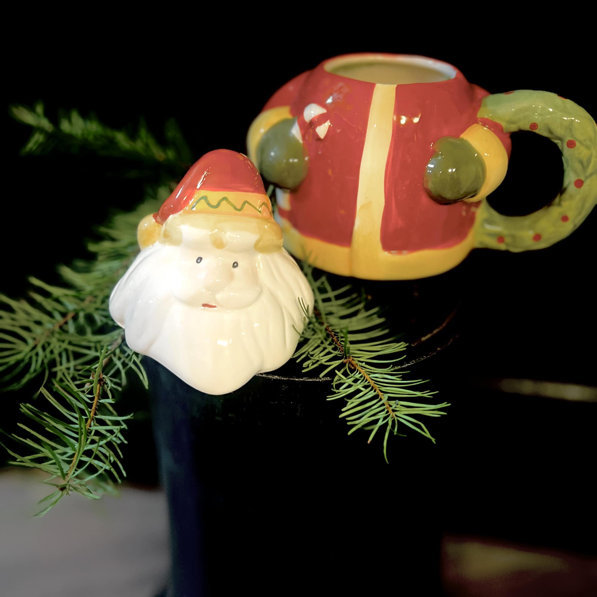 An adorable Ceramic Santa keepsake mug with a separate Santa head lid