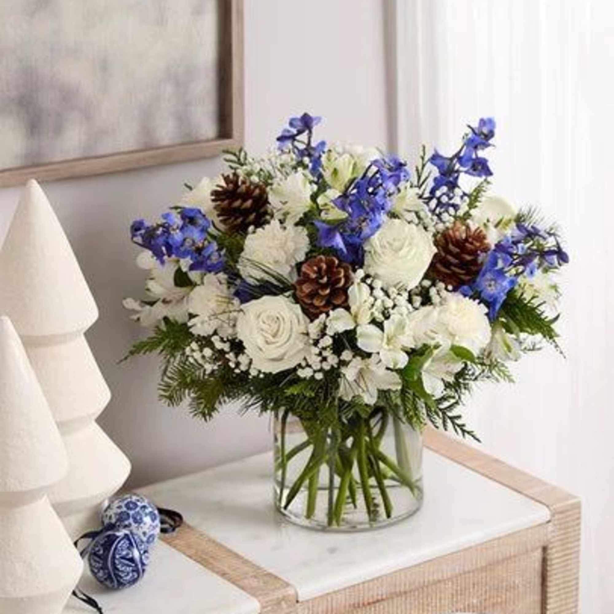 About Winter Best Wishes Bouquet
Inspired by winter&rsquo;s cool blue &amp; white landscape