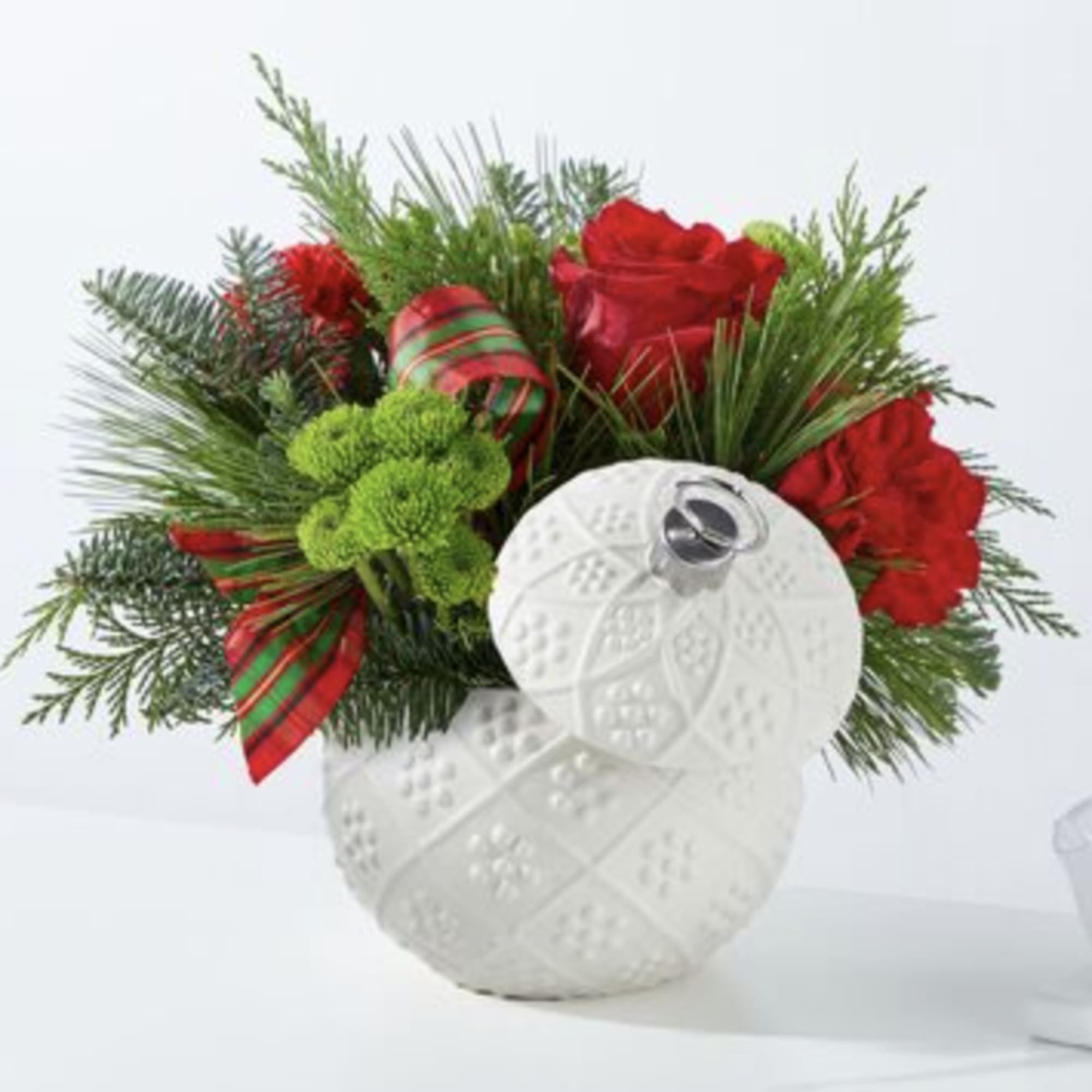 Start your holiday season with our stunning Trimming the Tree Bouquet. This