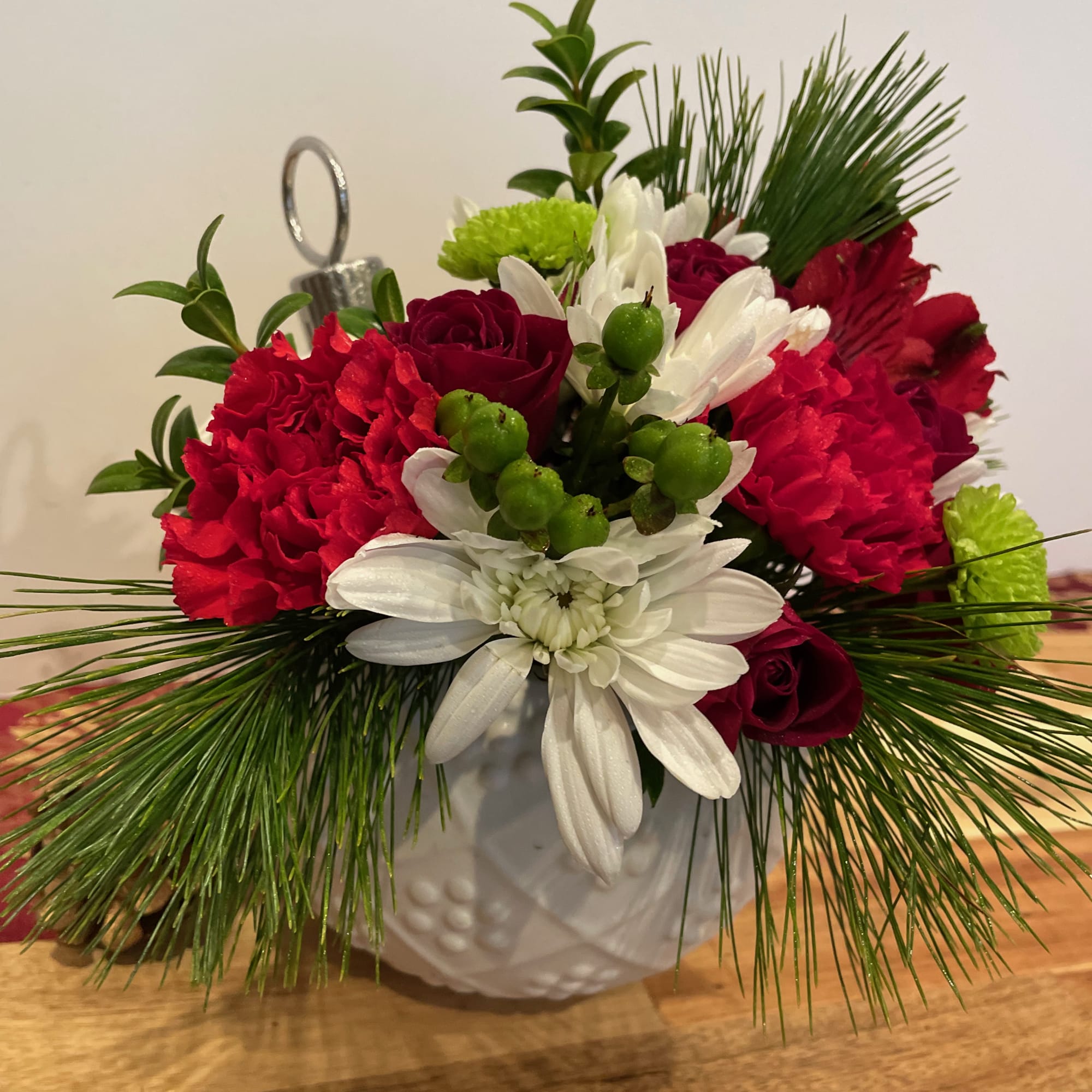 Start your holiday season with our stunning Trimming the Tree Bouquet. This