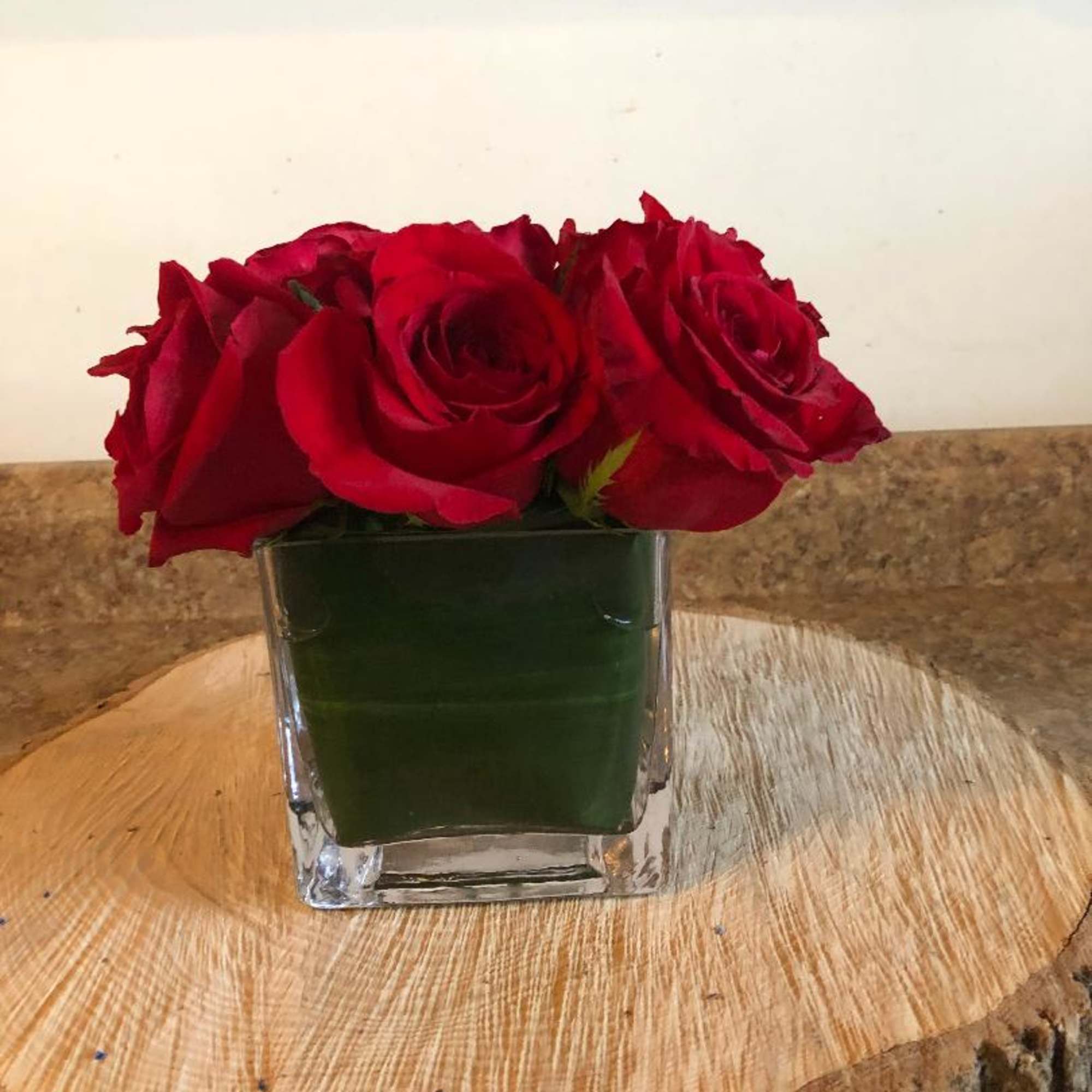 Cube vase with 9 roses. Perfect for a little something on her