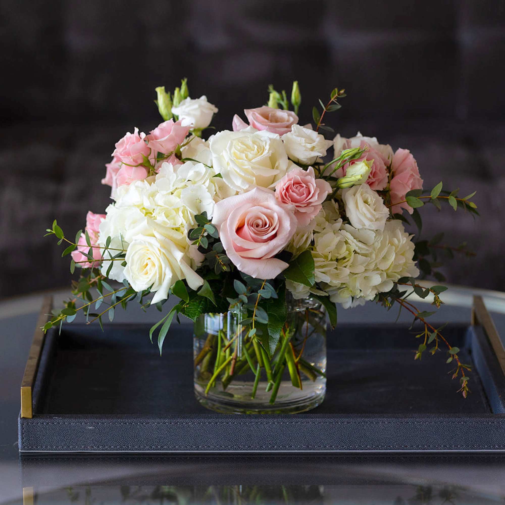 Soft shades of pink, peach, and ivory&mdash;reminiscent of a vintage English garden&mdash;come