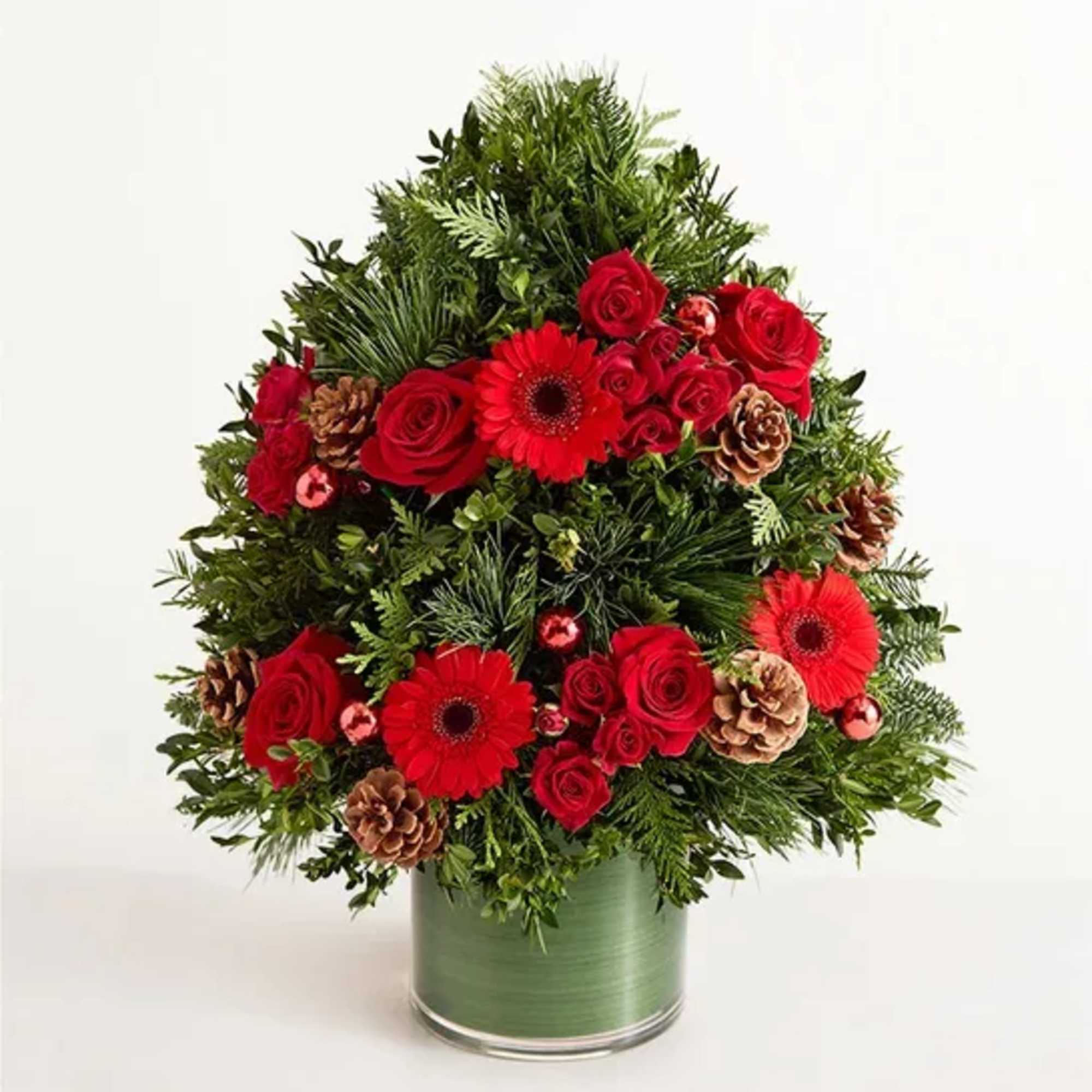 EXCLUSIVE Share the radiant wonder of Christmas. Our elegant evergreen tree arrangement