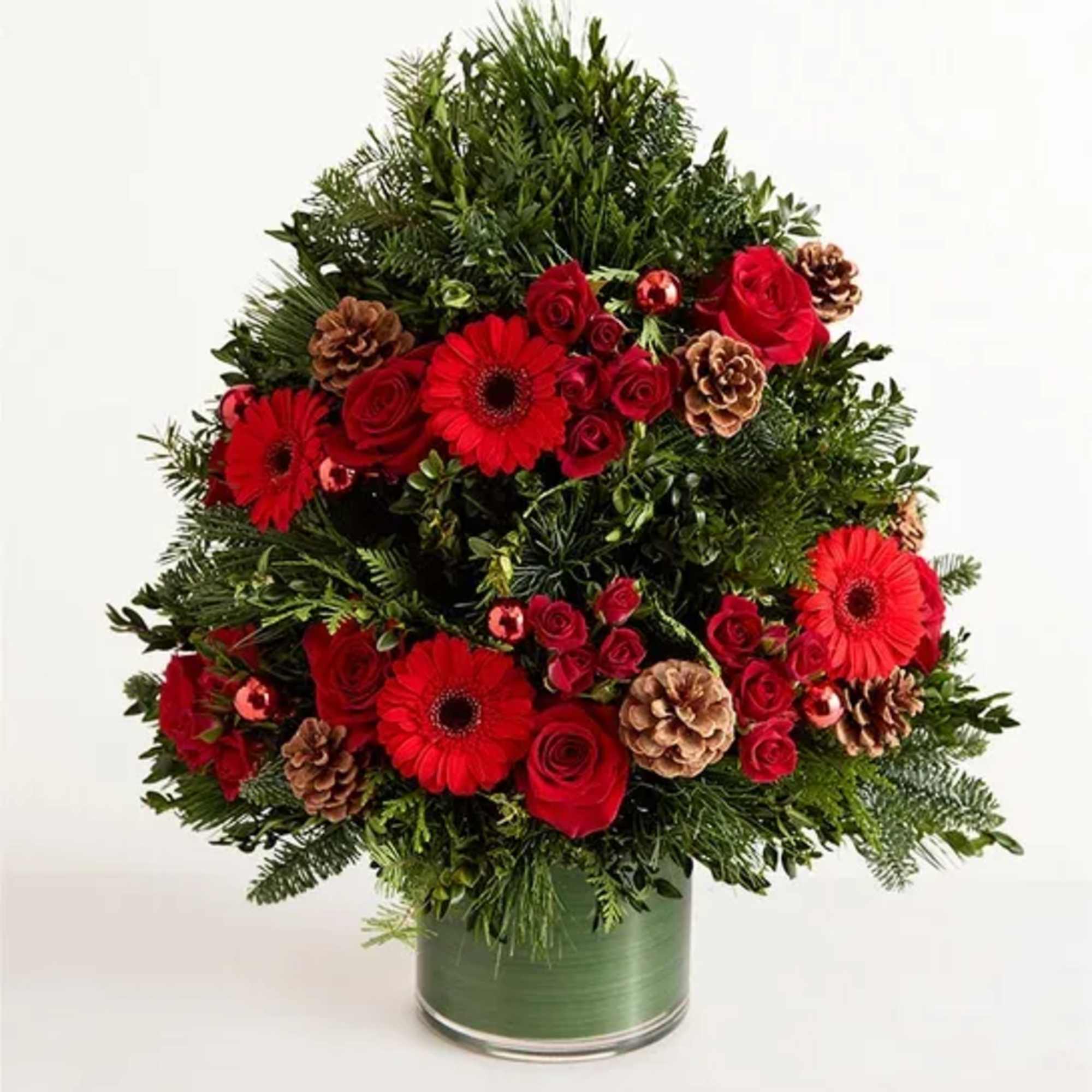 EXCLUSIVE Share the radiant wonder of Christmas. Our elegant evergreen tree arrangement