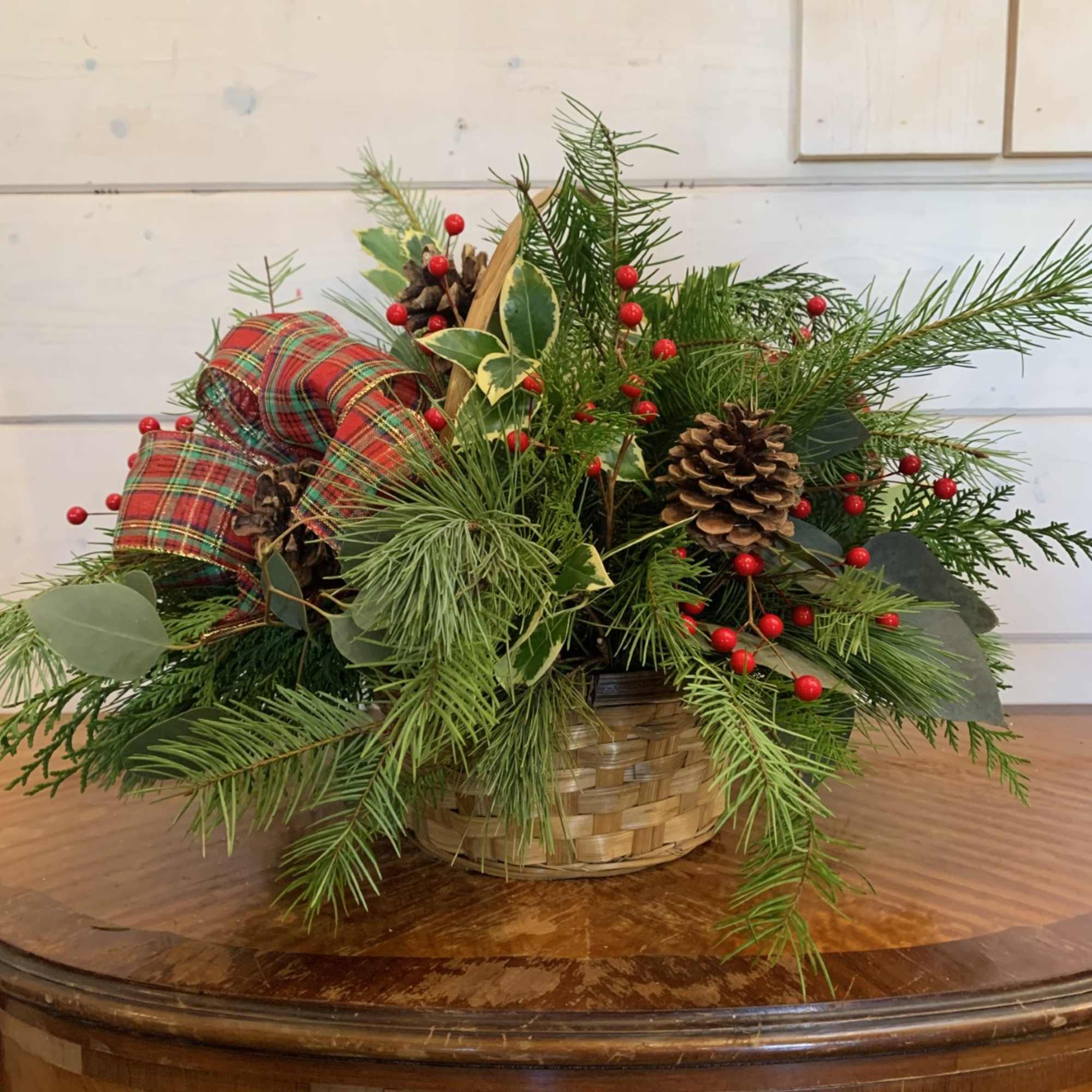 An oval stained woodchip basket with a hard liner offers a cheerful