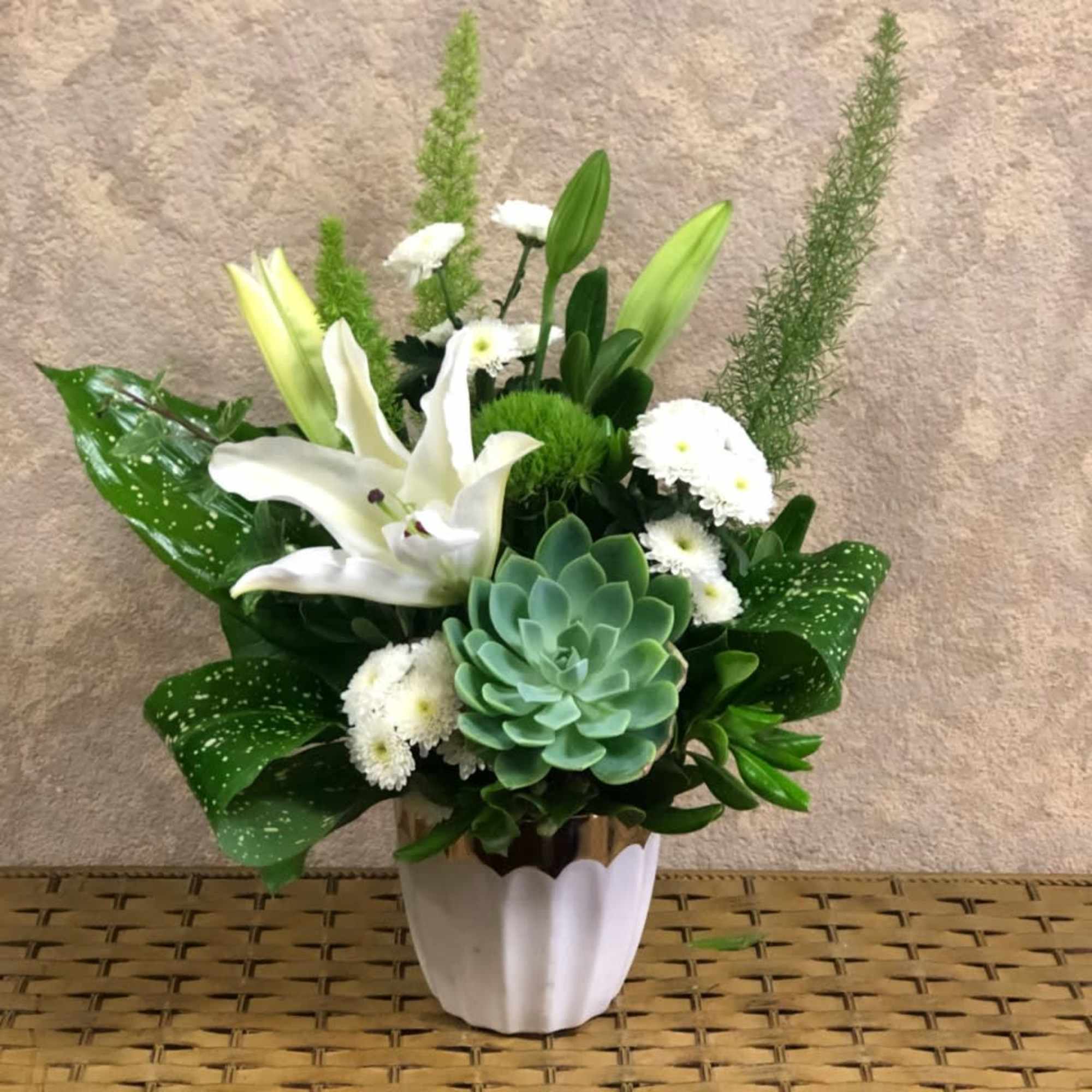 Type of Flowers: White Oriental Lilies, White Chrysanthemums, Tropical Leaves, Green Succulent