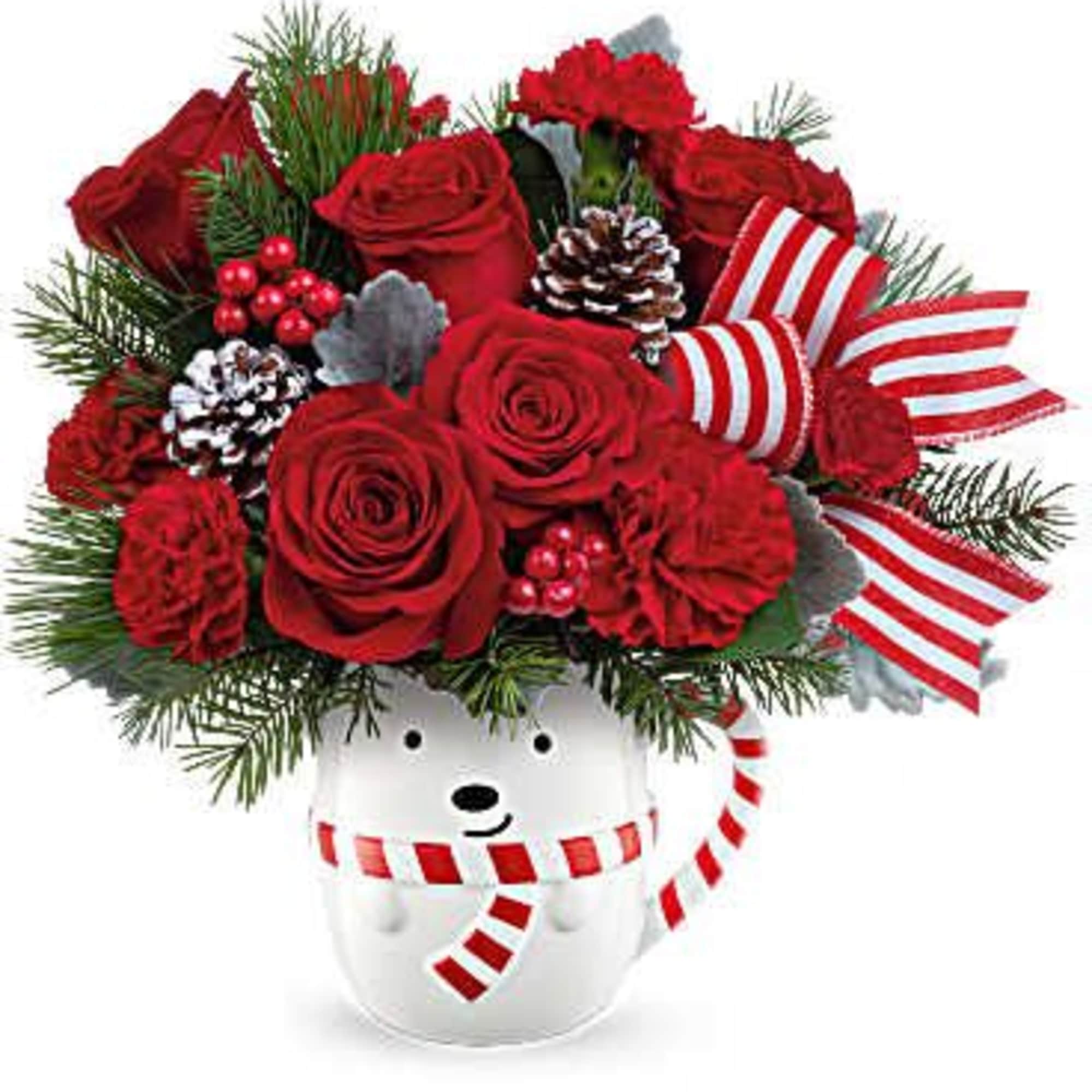 This cheerful red and white bouquet in an adorable bear cup will