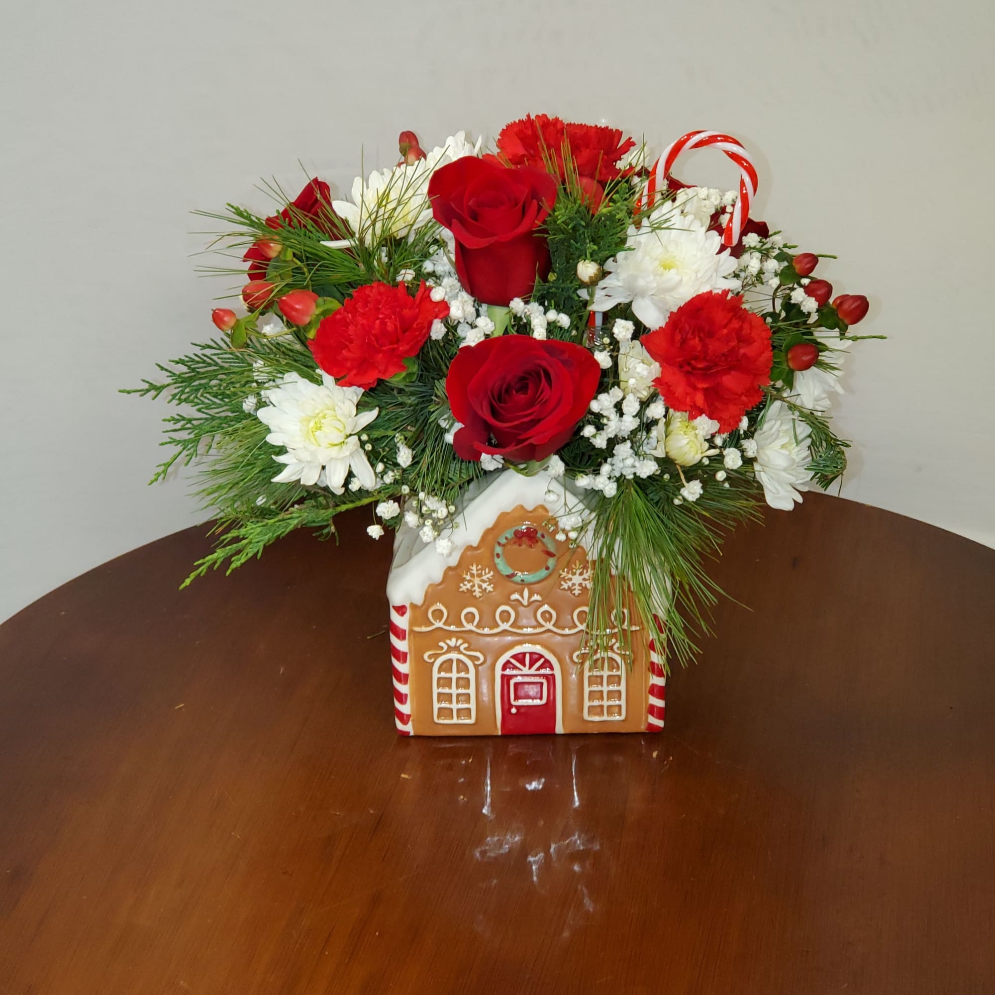 Nice Christmas arrangement in a gingerbread container 