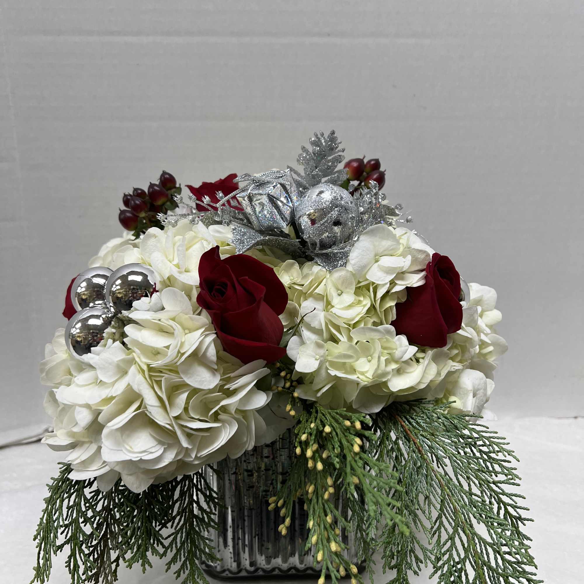 Send a beautiful holiday arrangement this season to let that special someone