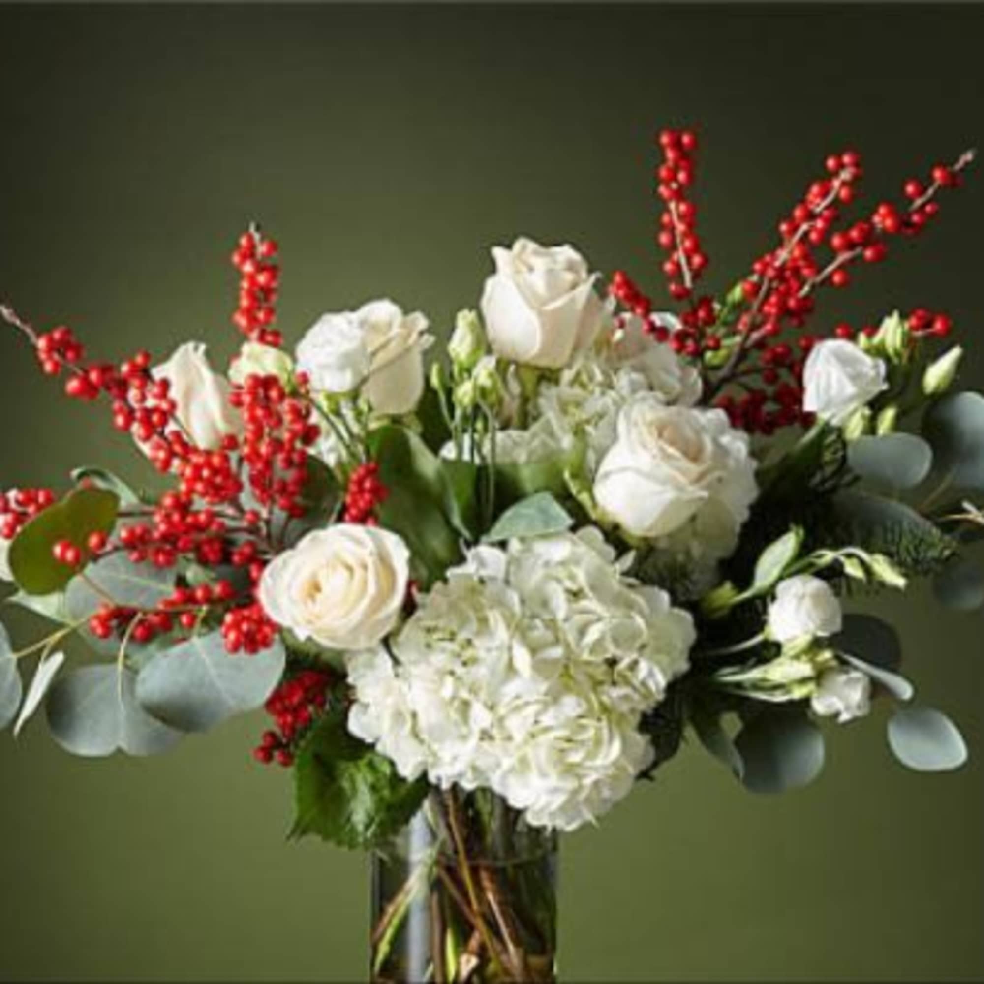 String boughs of holly throughout your home with our Winter Forest Bouquet.