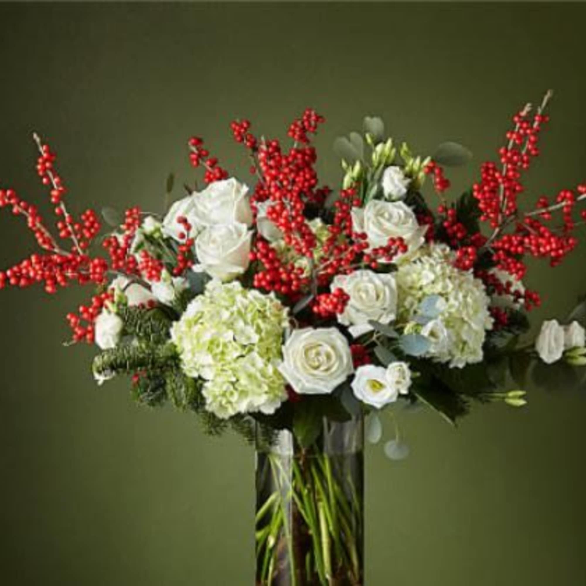 String boughs of holly throughout your home with our Winter Forest Bouquet.