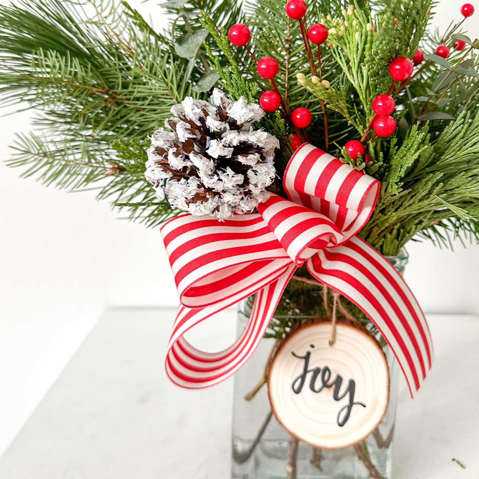 This arrangement is long lasting as it is full of greens, berries