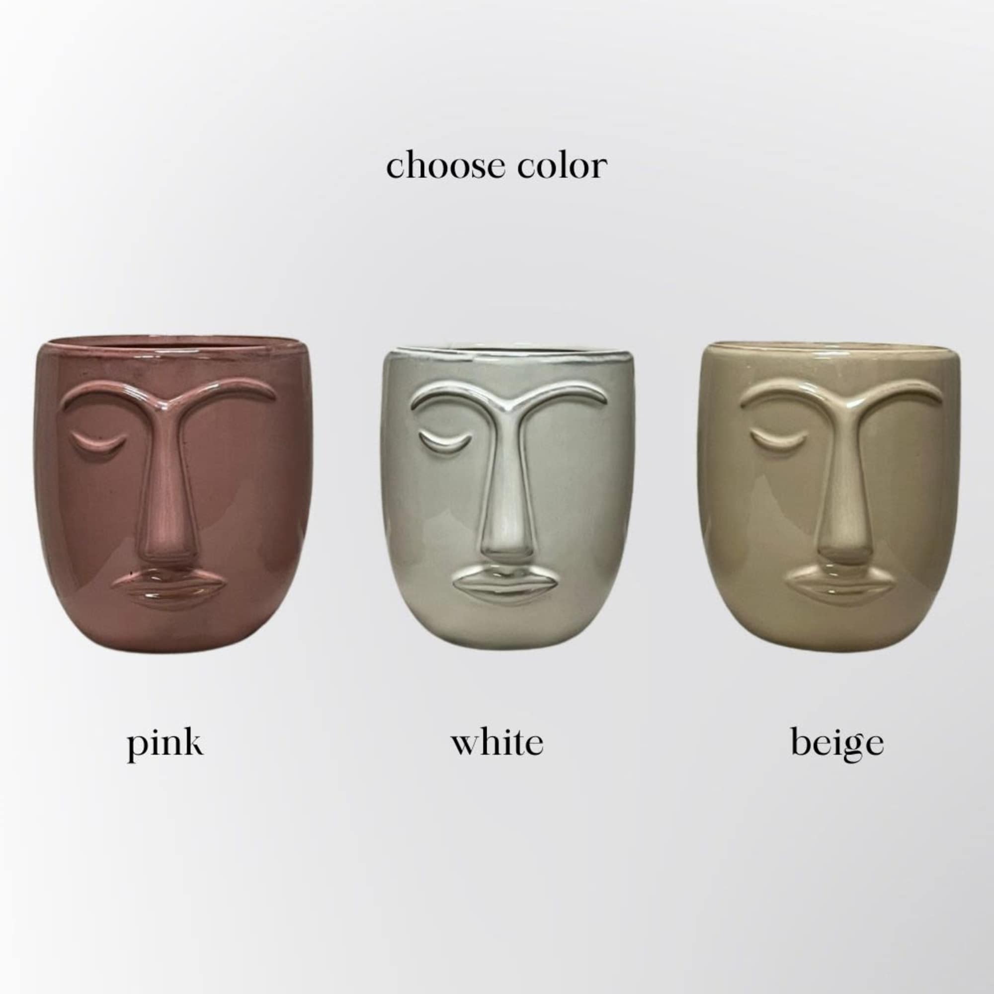 Art meets nature in this abstract face vase filled with colorful, lively